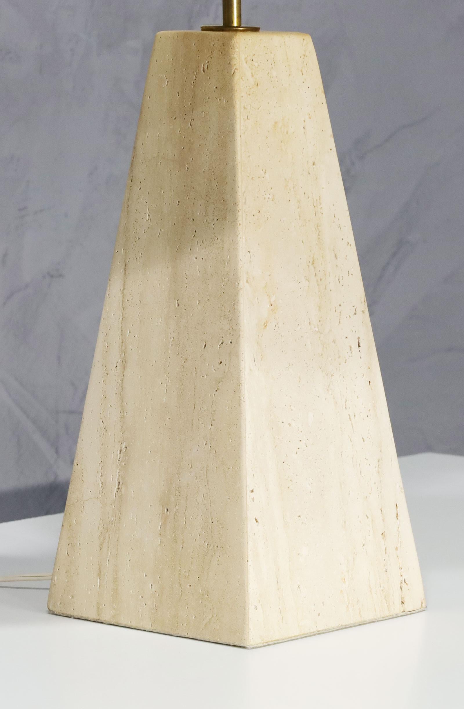Beautifully simple organic travertine table lamp in a pyramid shape. The lamp base is 7.38