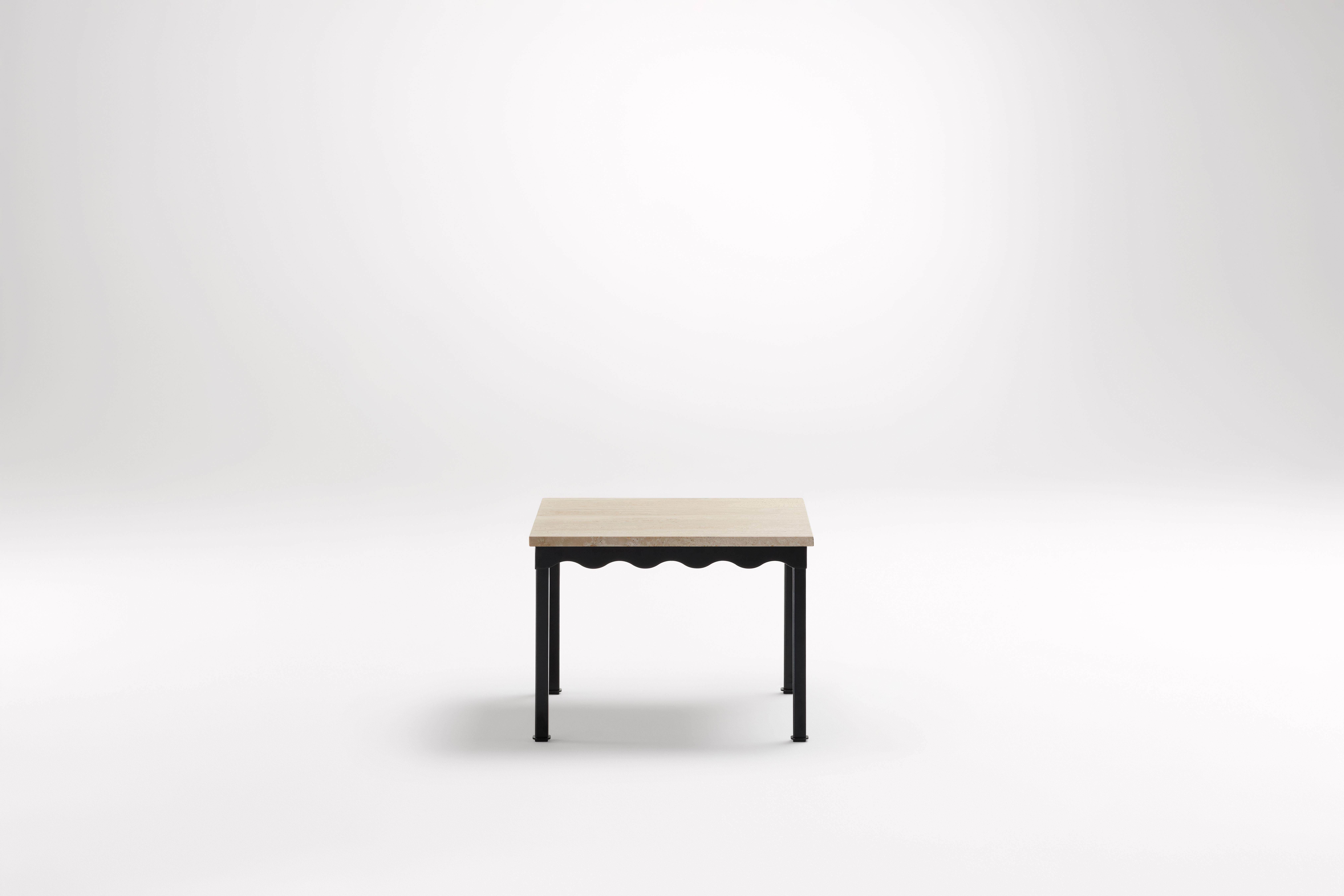 Travertine Bellini Side Table by Coco Flip
Dimensions: D 54 x W 54 x H 39 cm
Materials: Stone top, Powder-coated steel frame. 
Weight: 12 kg


Coco Flip is a Melbourne based furniture and lighting design studio, run by us, Kate Stokes and Haslett
