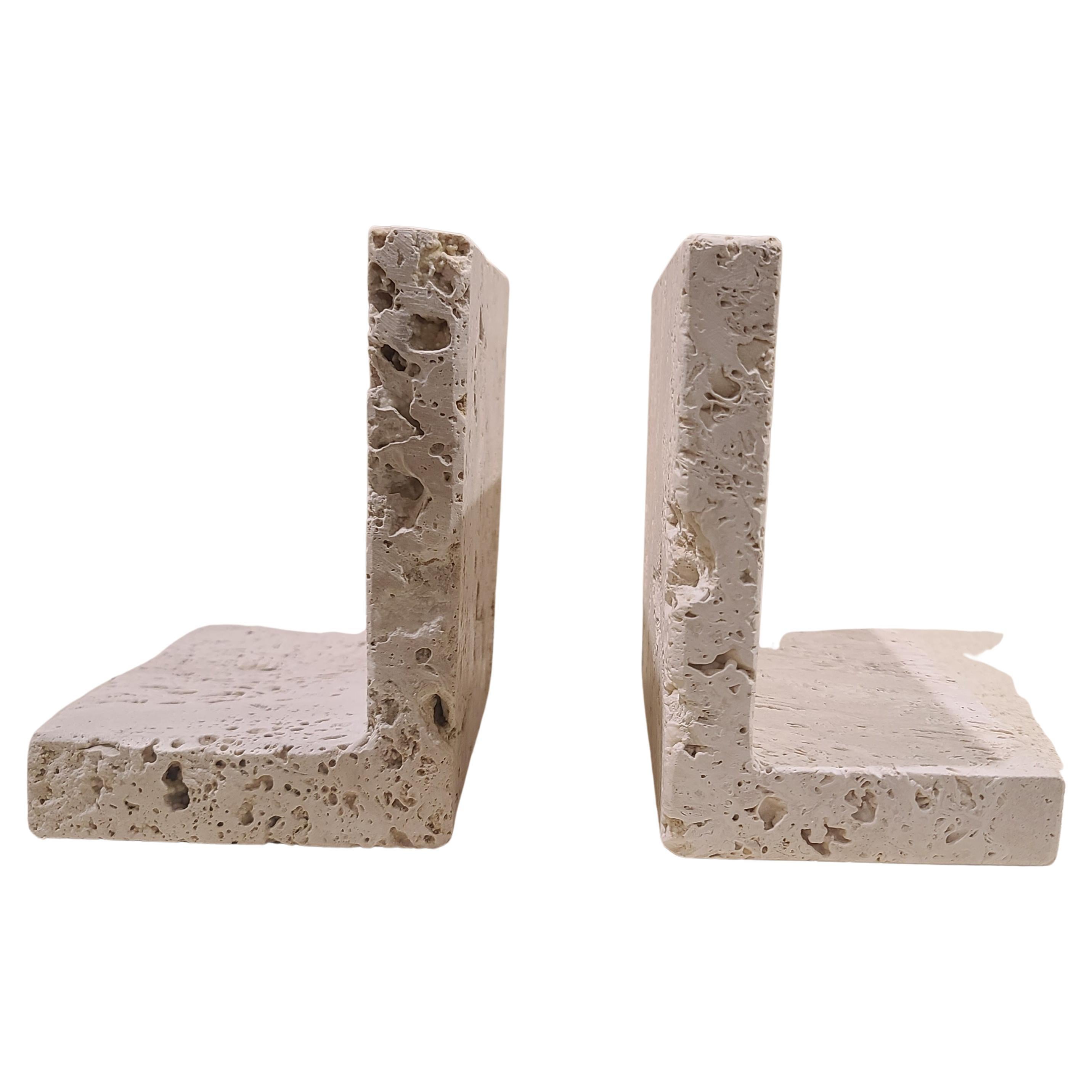 Travertine bookends are elegant and functional accessories for organizing and displaying books. Crafted from natural travertine stone, these bookends often feature unique patterns and earthy tones, adding a touch of sophistication to any bookshelf