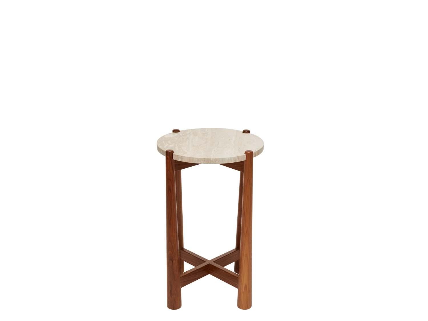 The Bronson drinks table features a round stone top with notched corners that rest atop a detailed walnut or oak base.

The Lawson-Fenning collection is designed and handmade in Los Angeles, California. Reach out to discover what options are