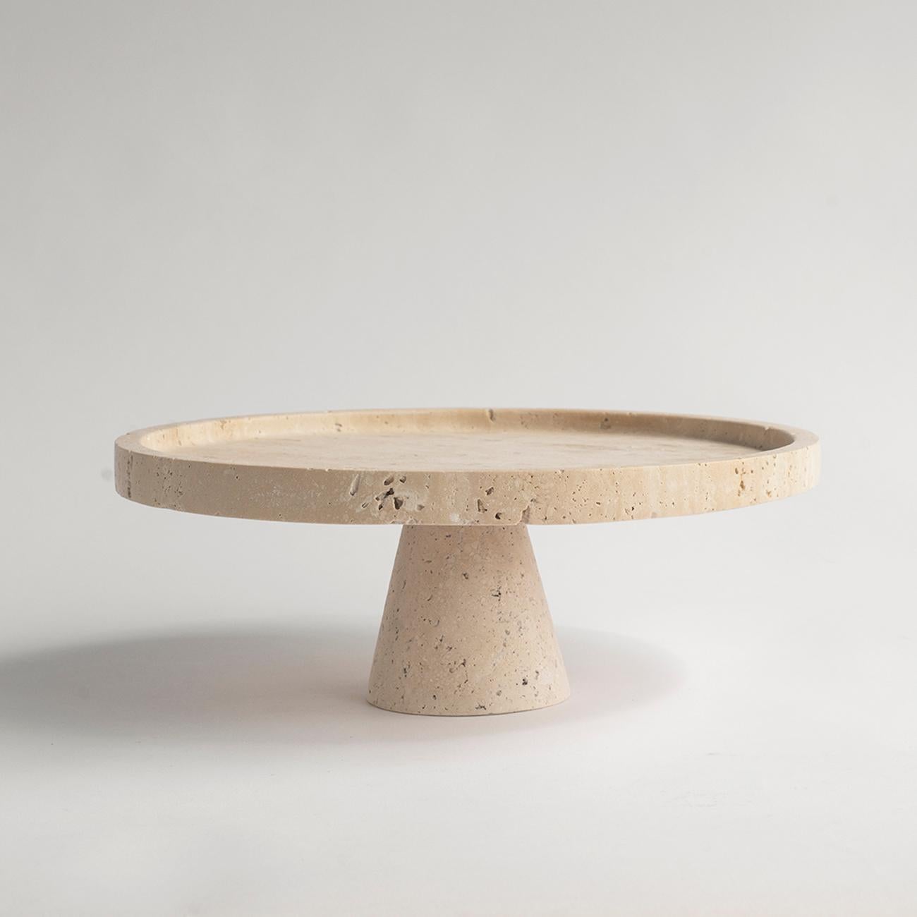Put your delectable desserts on a pedestal with this gorgeous travertine cake stand from Kiwano. Hand crafted by Turkish artisans, this stylish display will ensure your baking skills never go unnoticed. Glass dome not included. We recommend to put a