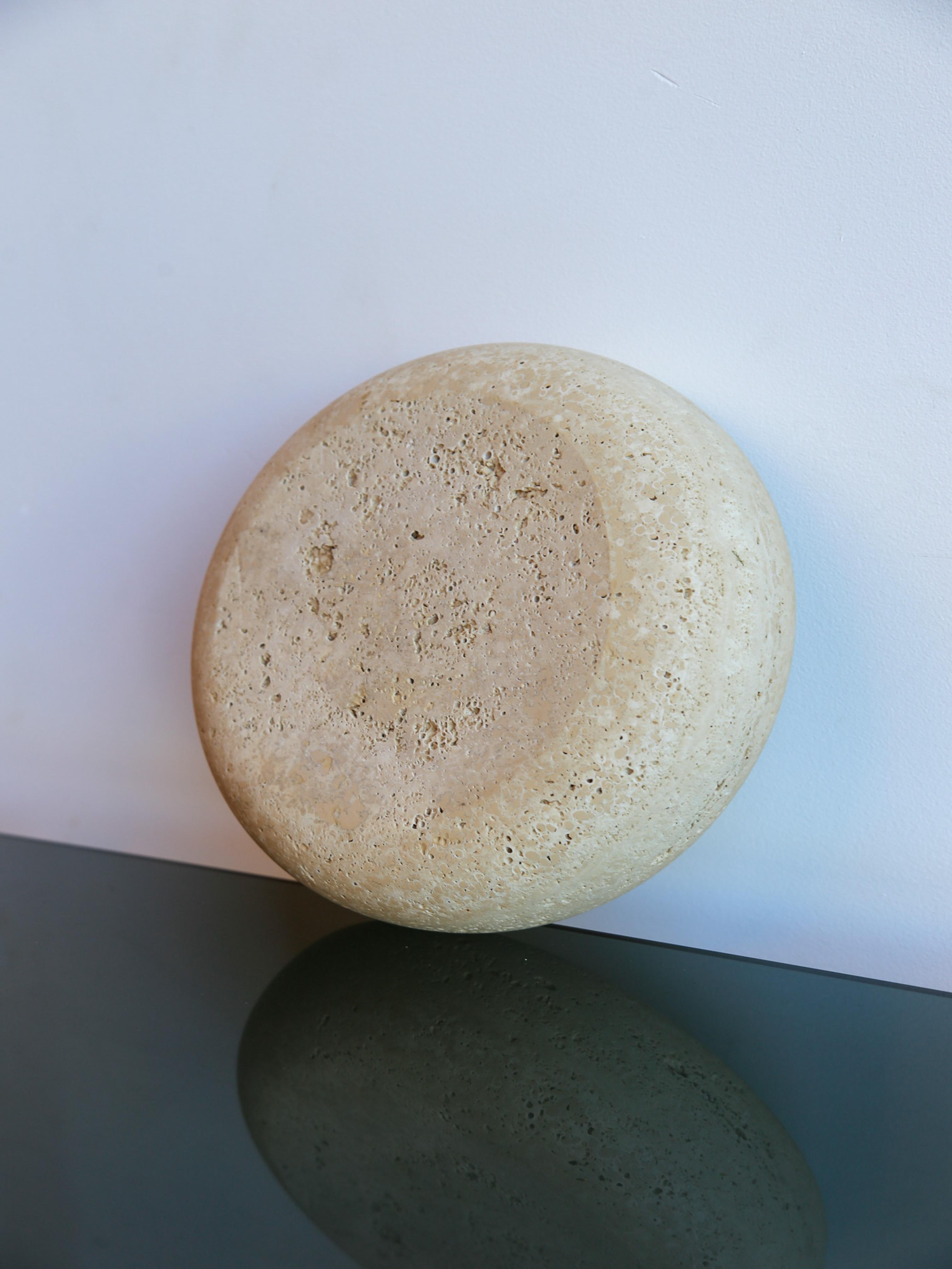 Fratelli Mannelli travertine bowl, a timeless piece of mid-century Italian craftsmanship. Hand-carved from natural travertine stone, this bowl showcases its unique porous texture and warm, earthy tones, making it a perfect centerpiece for any modern