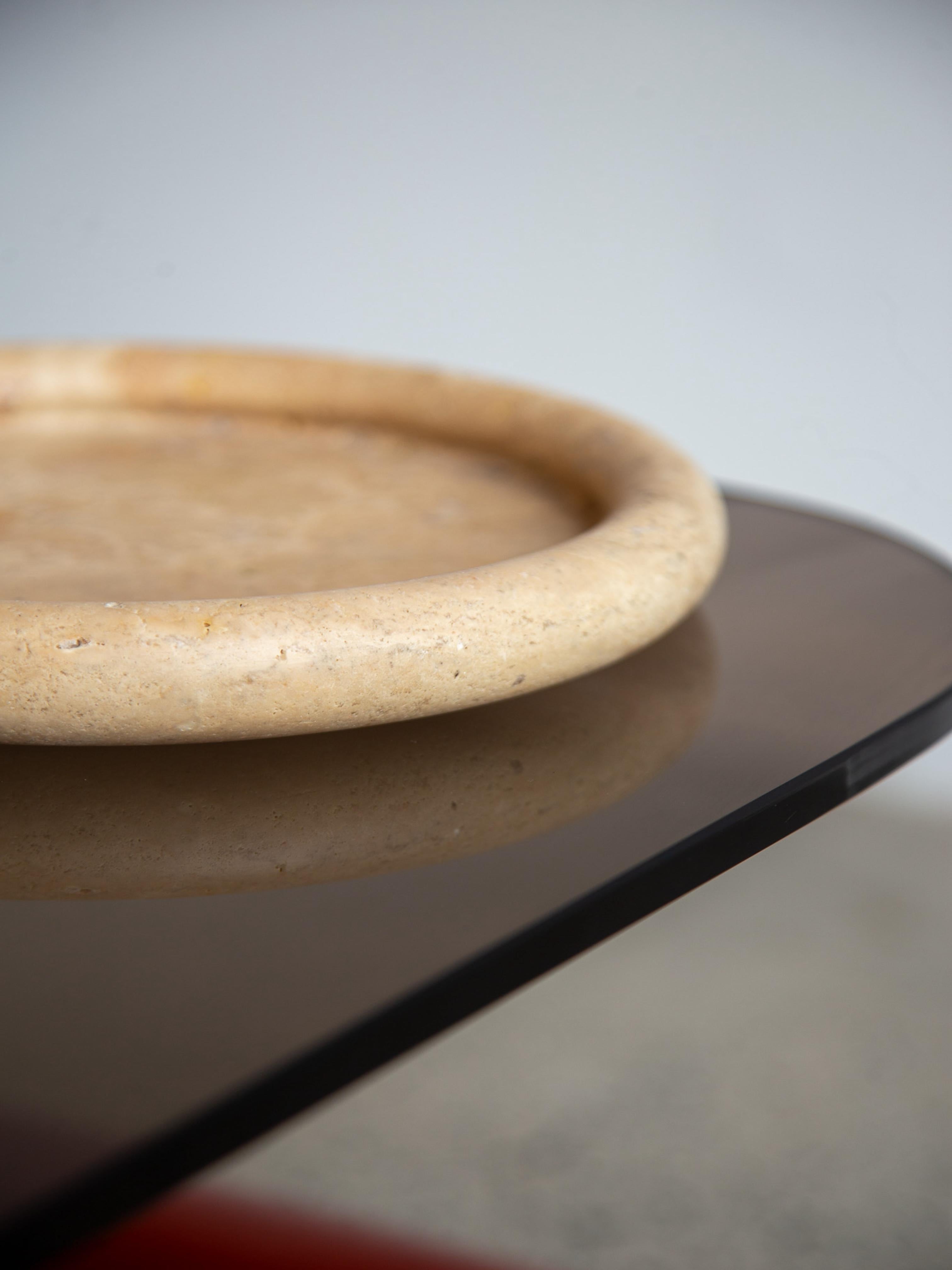 Fratelli Mannelli travertine bowl, a timeless piece of mid-century Italian craftsmanship. Hand-carved from natural travertine stone, this bowl showcases its unique porous texture and warm, earthy tones, making it a perfect centerpiece for any modern