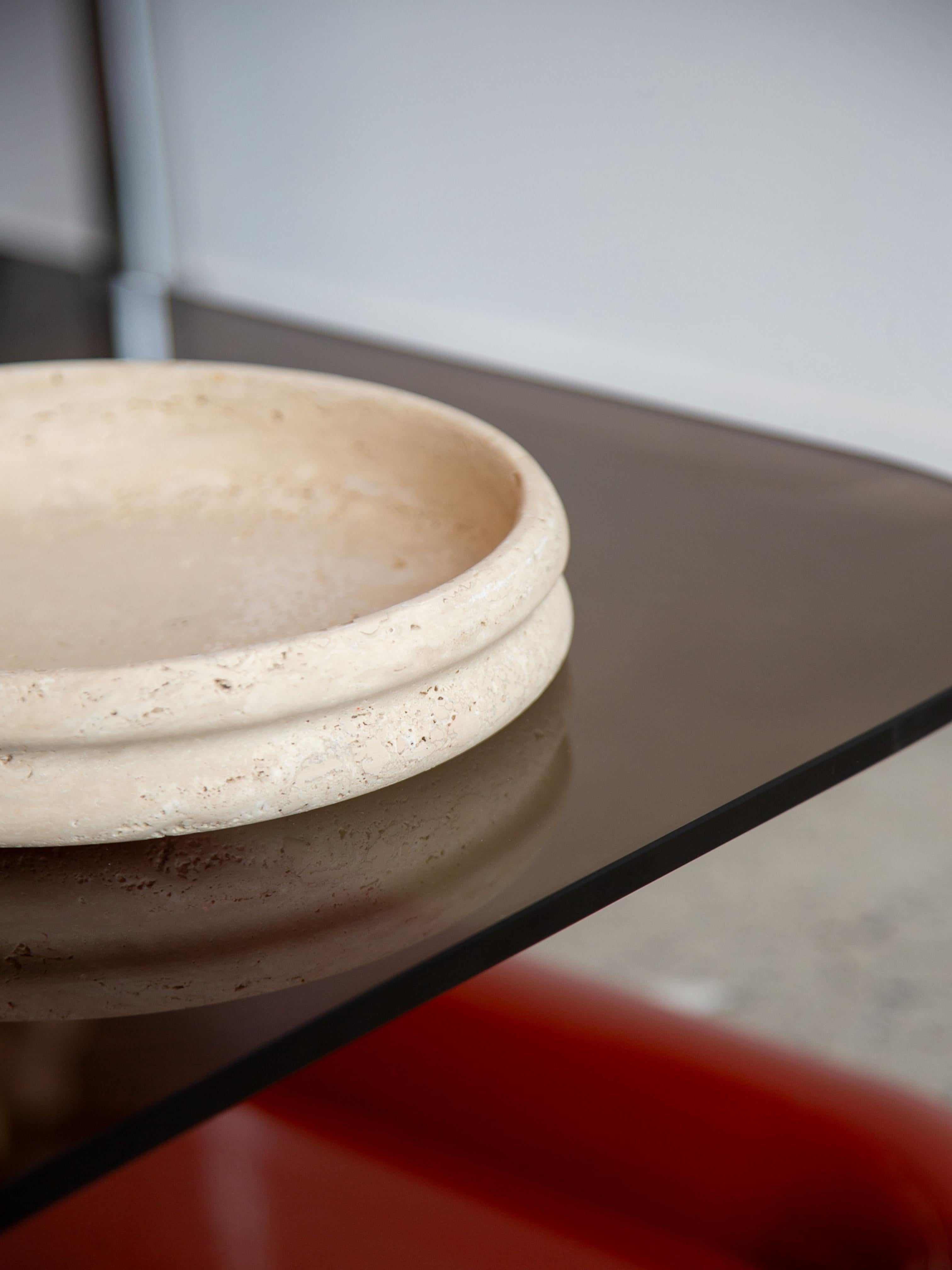 Fratelli Mannelli travertine bowl, a timeless piece of mid-century Italian craftsmanship. Hand-carved from natural travertine stone, this bowl showcases its unique porous texture and warm, earthy tones, making it a perfect centerpiece for any modern