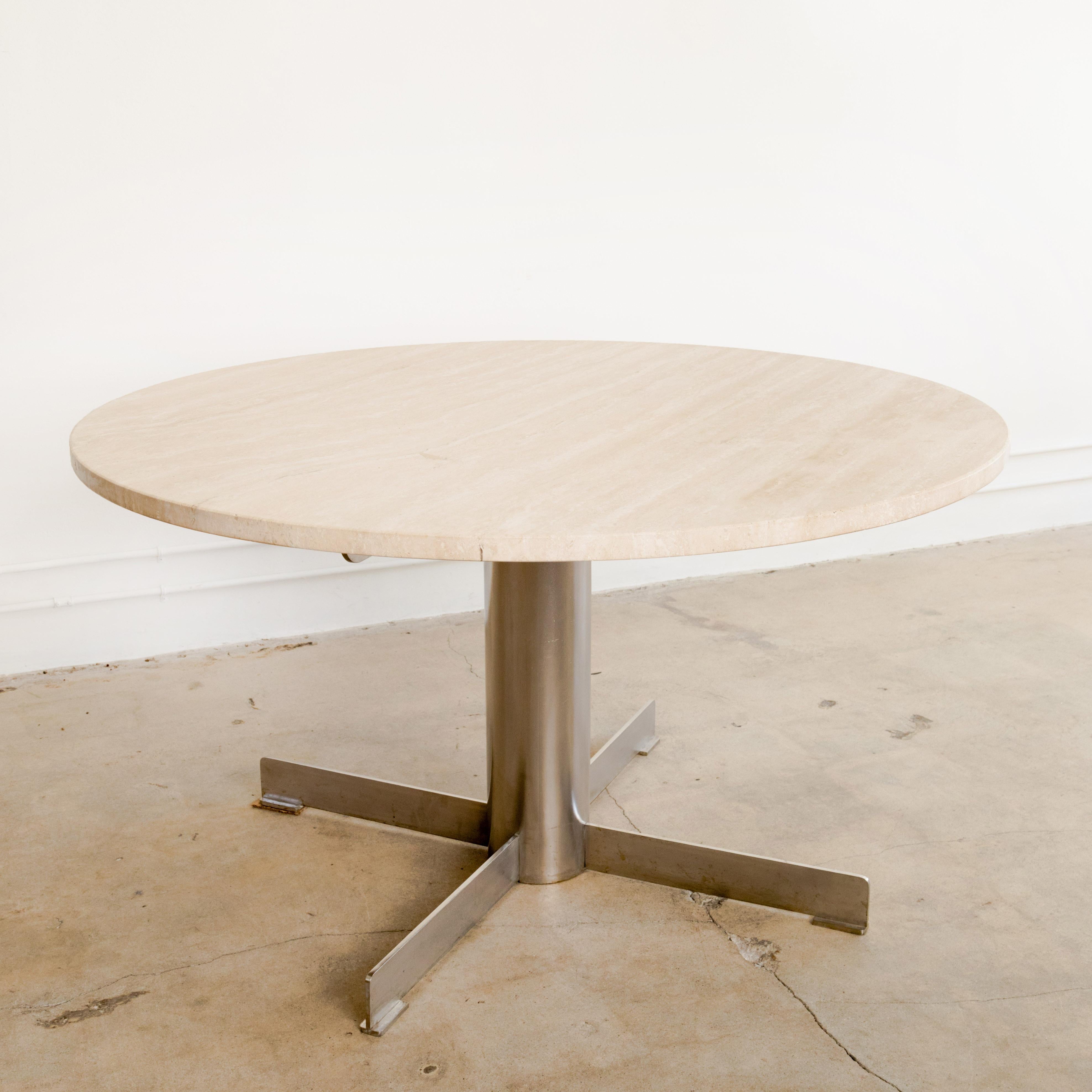 Round travertine top and chrome base pedestal dining table, France Circa 1970's.
