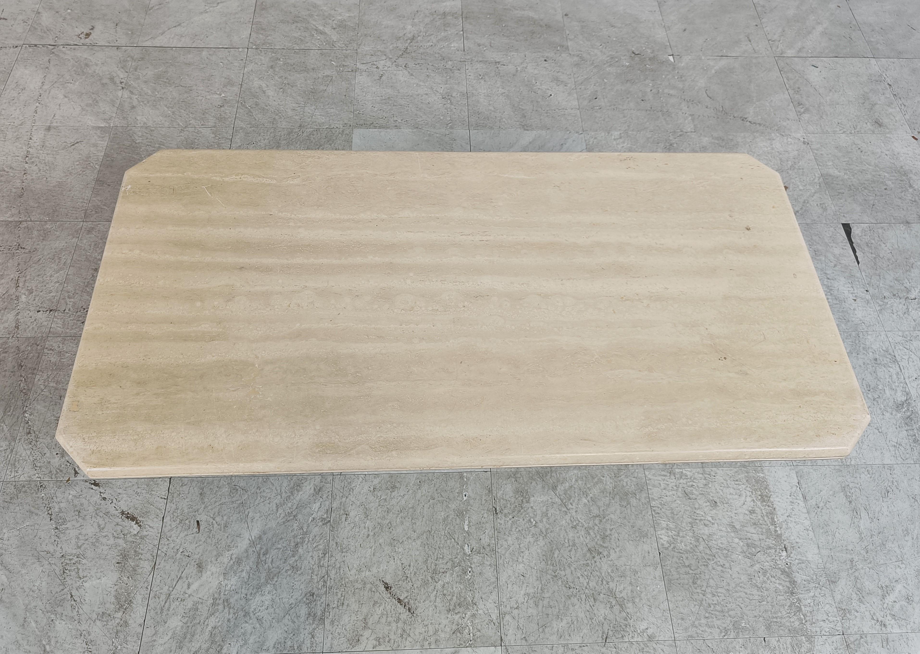 Vintage travertine coffee table with a cross shaped base.

Beautiful natural travertine stone.

Good condition with normal age related wear

1970s - Italy

Height: 37cm/14.56