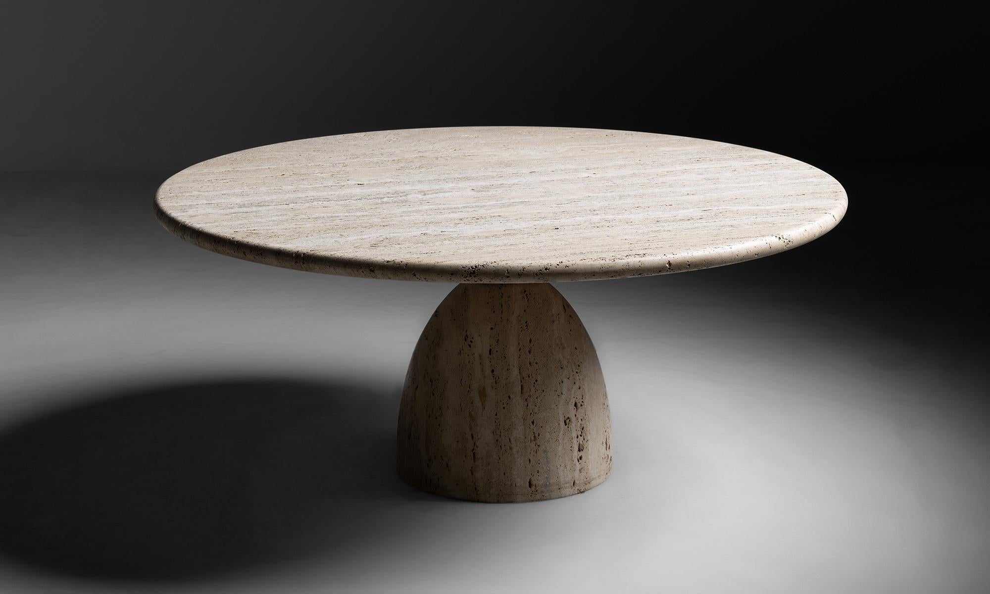 Travertine coffee table by Peter Draenert

Germany Circa 1970

Circular travertine top on teardrop shaped metal form attached to travertine base.

Measures: 43” diameter x 18.75” height.