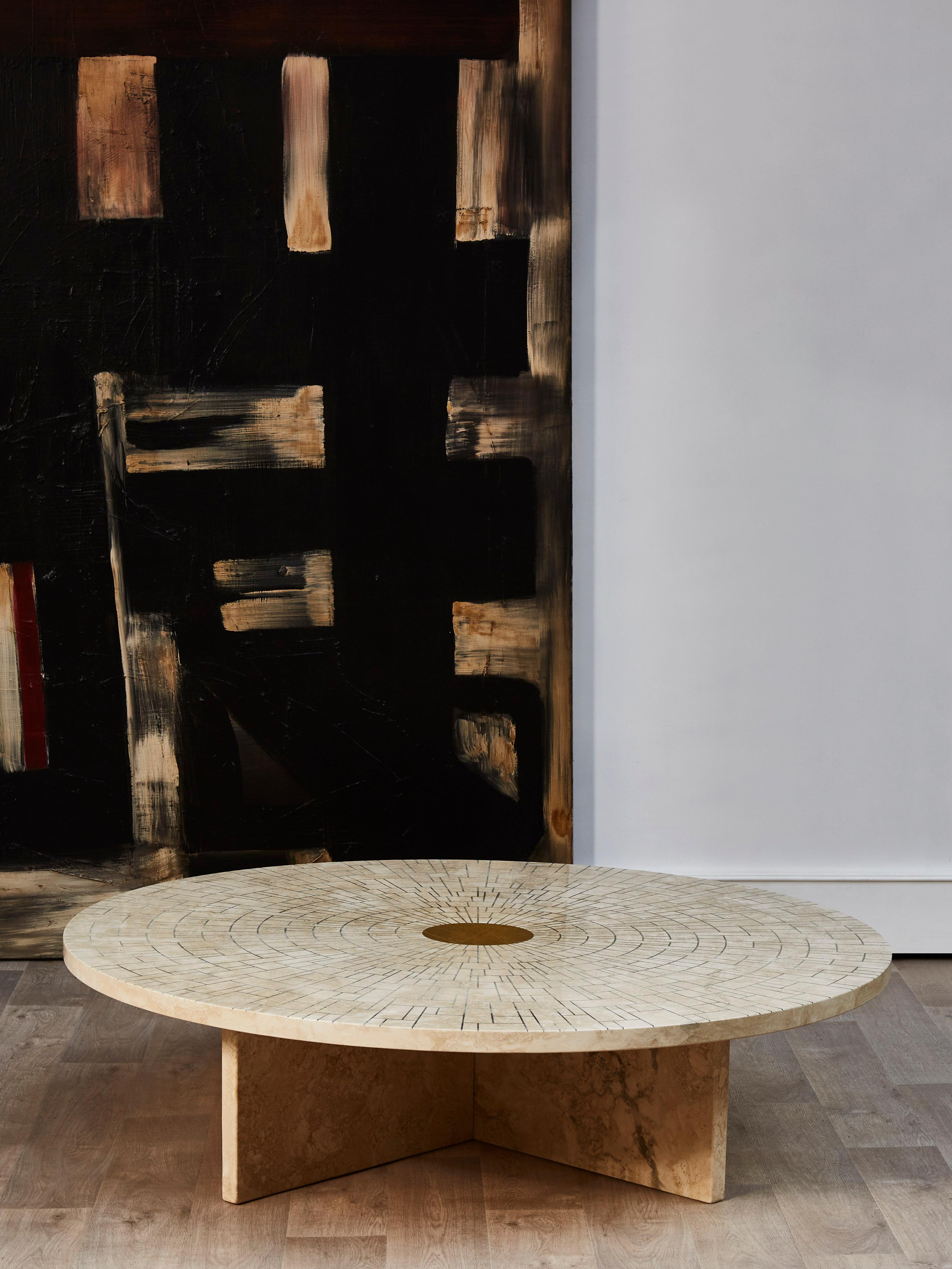 Unique coffee table in travertine stone worked in marquetry and brass. 
Creation by Studio Glustin.
France, 2021.