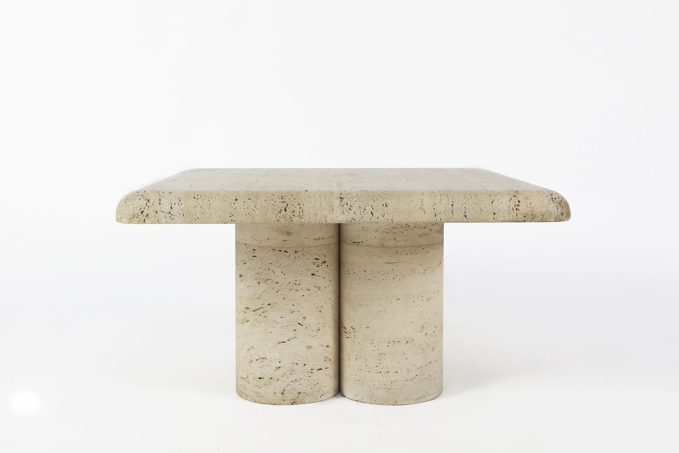 Rare side table or small coffee table in travertine made in Italy in the 1970s by Up&Up
This coffee table consists of four cylindrical legs and a square table top with rounded edges.
The top comes off for easy moving.
