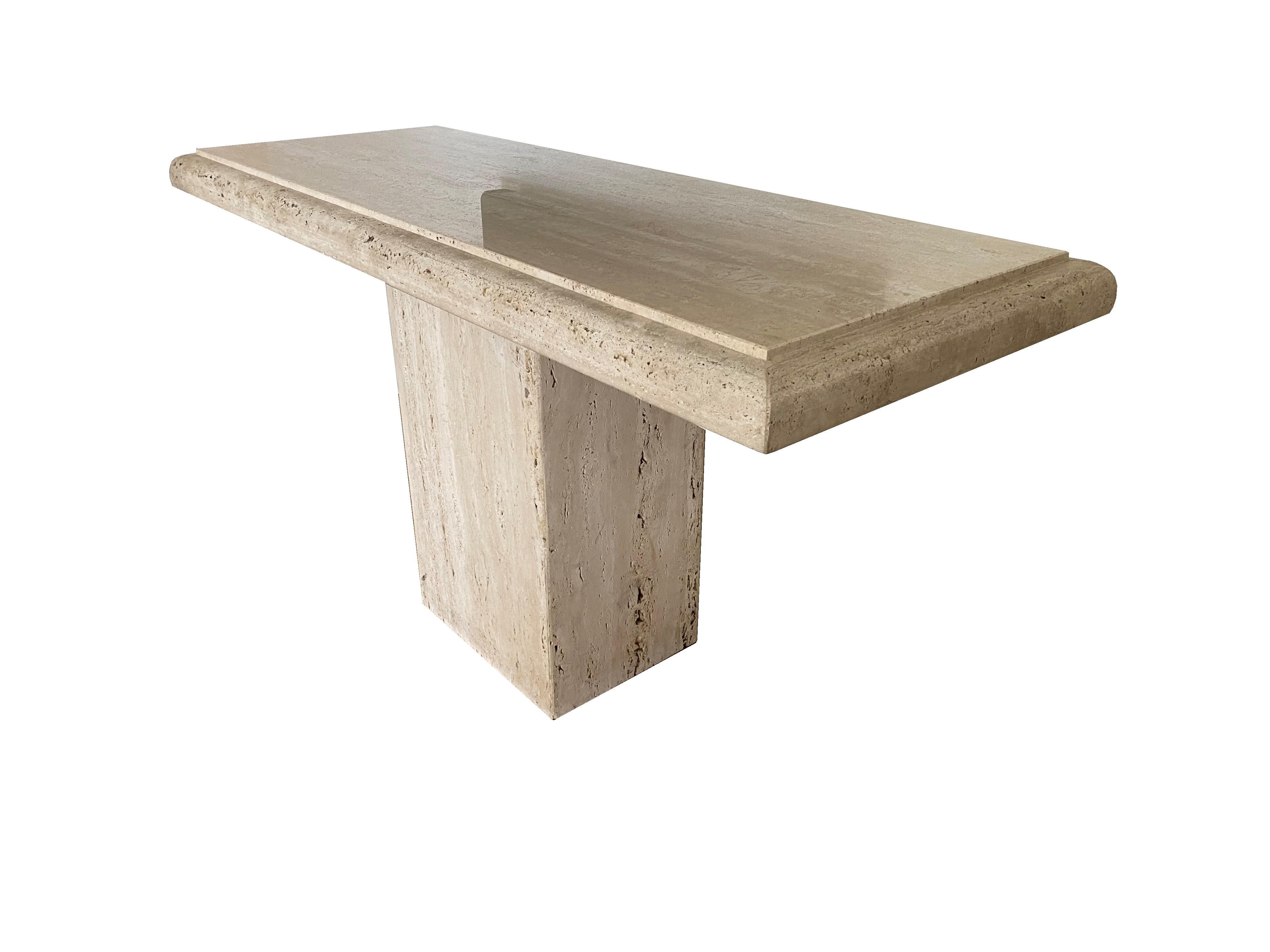 Travertine Console table. Hand made in Italy. A classic statement piece in any setting.