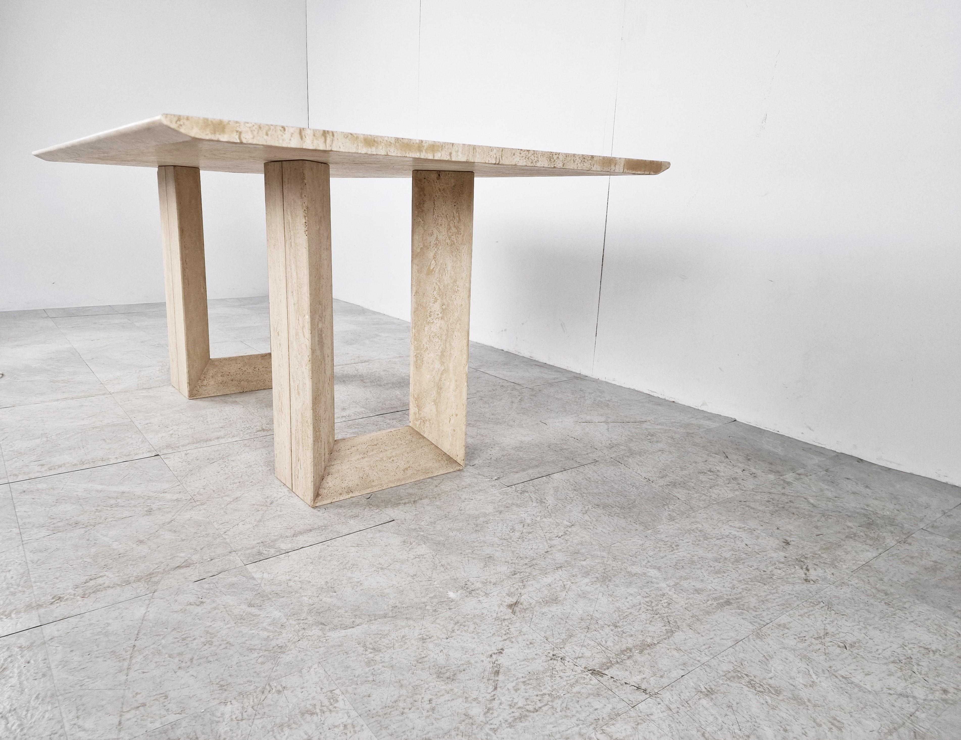 Architectural travertine dining table model 'Diapason' by Cattelan Italy.

Beautiful natural travertine.

Fantastic looking table with a timeless design.

1970s - Italy

Good condition

Dimensions:
Height: 74cm/29.13