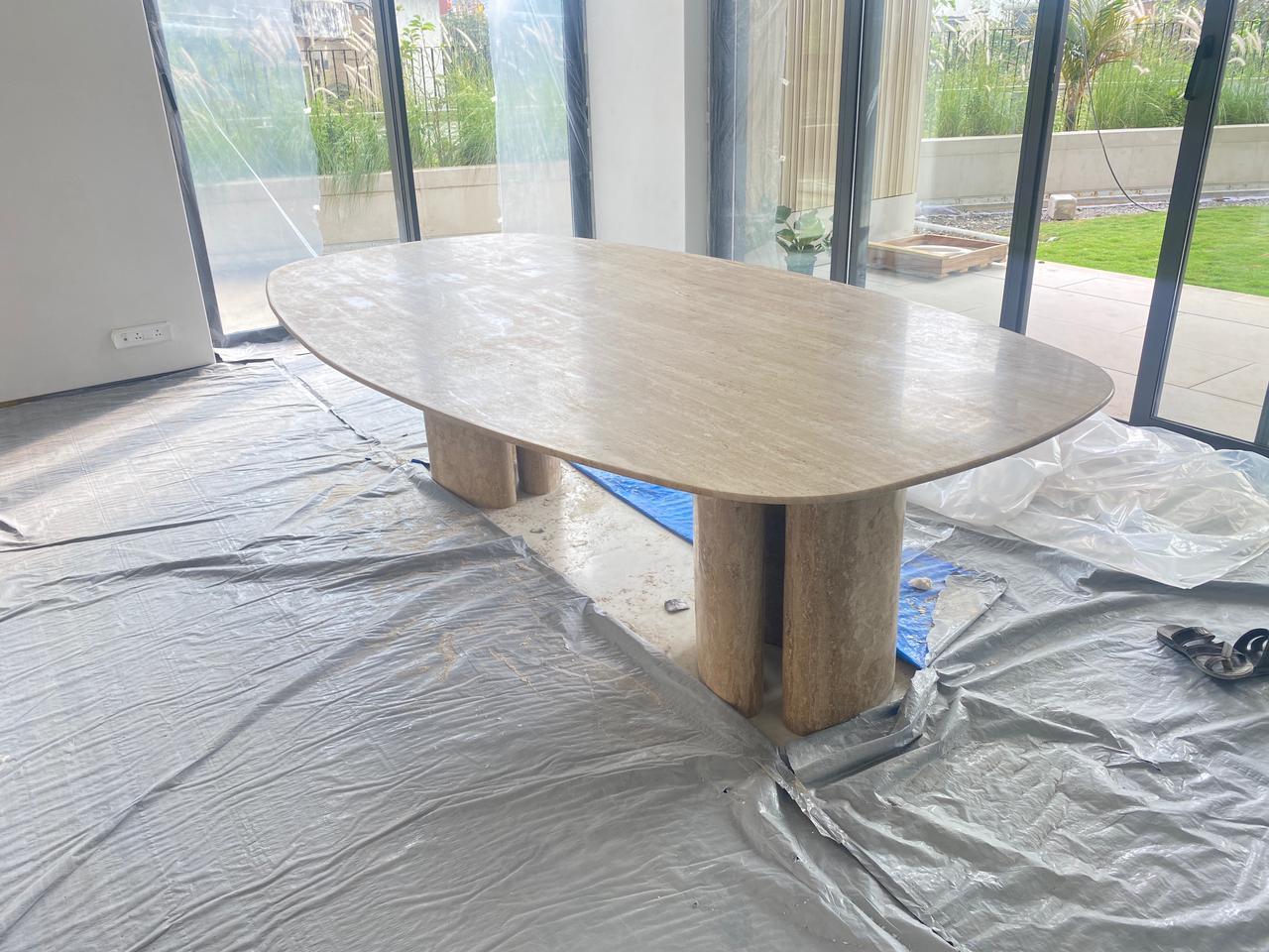 Mid-Century Modern Travertine Dining table in Oval Shape with Solid Legs For Sale