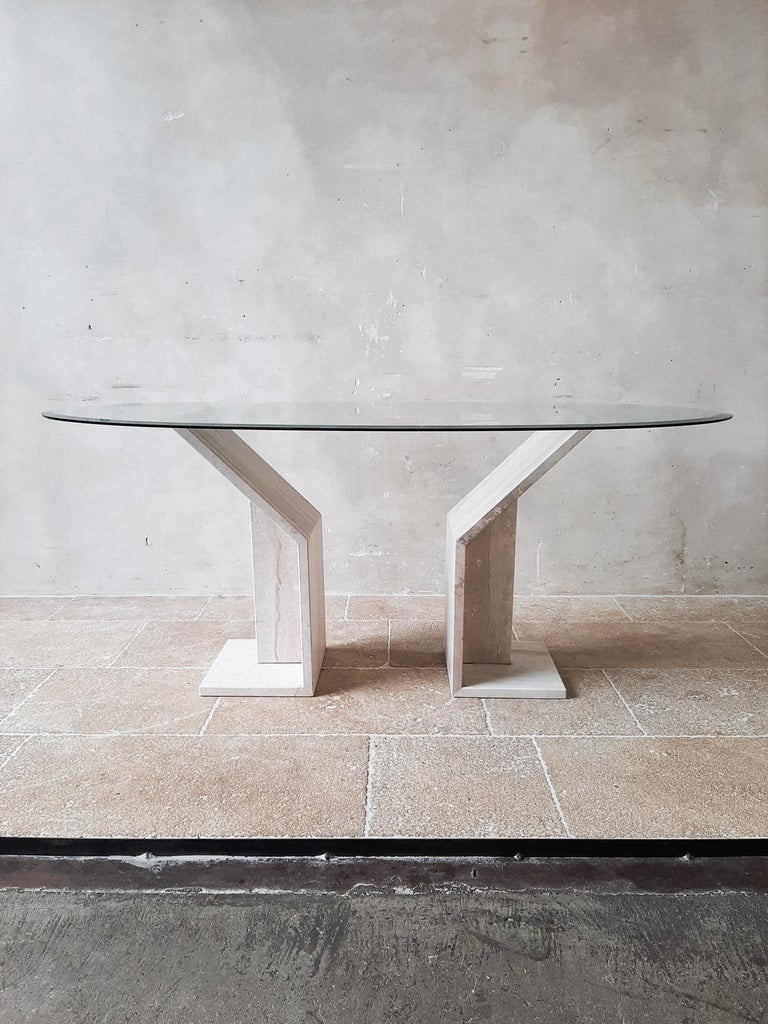 Vintage Italian dining table base made of two geometric travertine shapes. Very stylish Midcentury table bases from Italy in the 1970s. Add a glass top to this table and it will certainly be an eyecatcher in any interior!

Measurements of the two