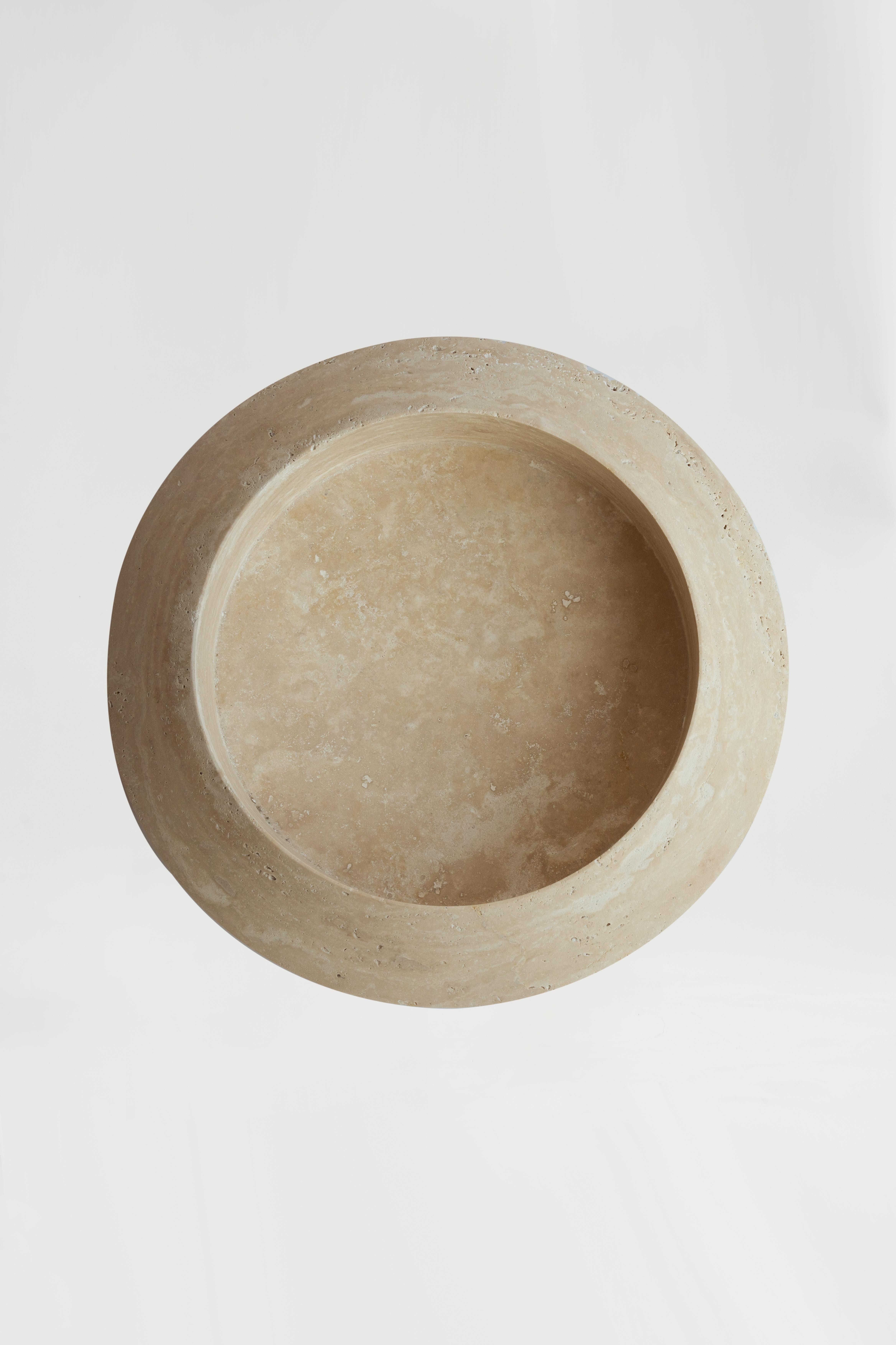 Make a bold statement with the Eclipse Bowl in natural travertine. This XXL edition is the largest piece in our bestselling Eclipse series, measuring an impressive 23.5 inches in diameter.

Crafted from solid travertine, each bowl is one of a kind,