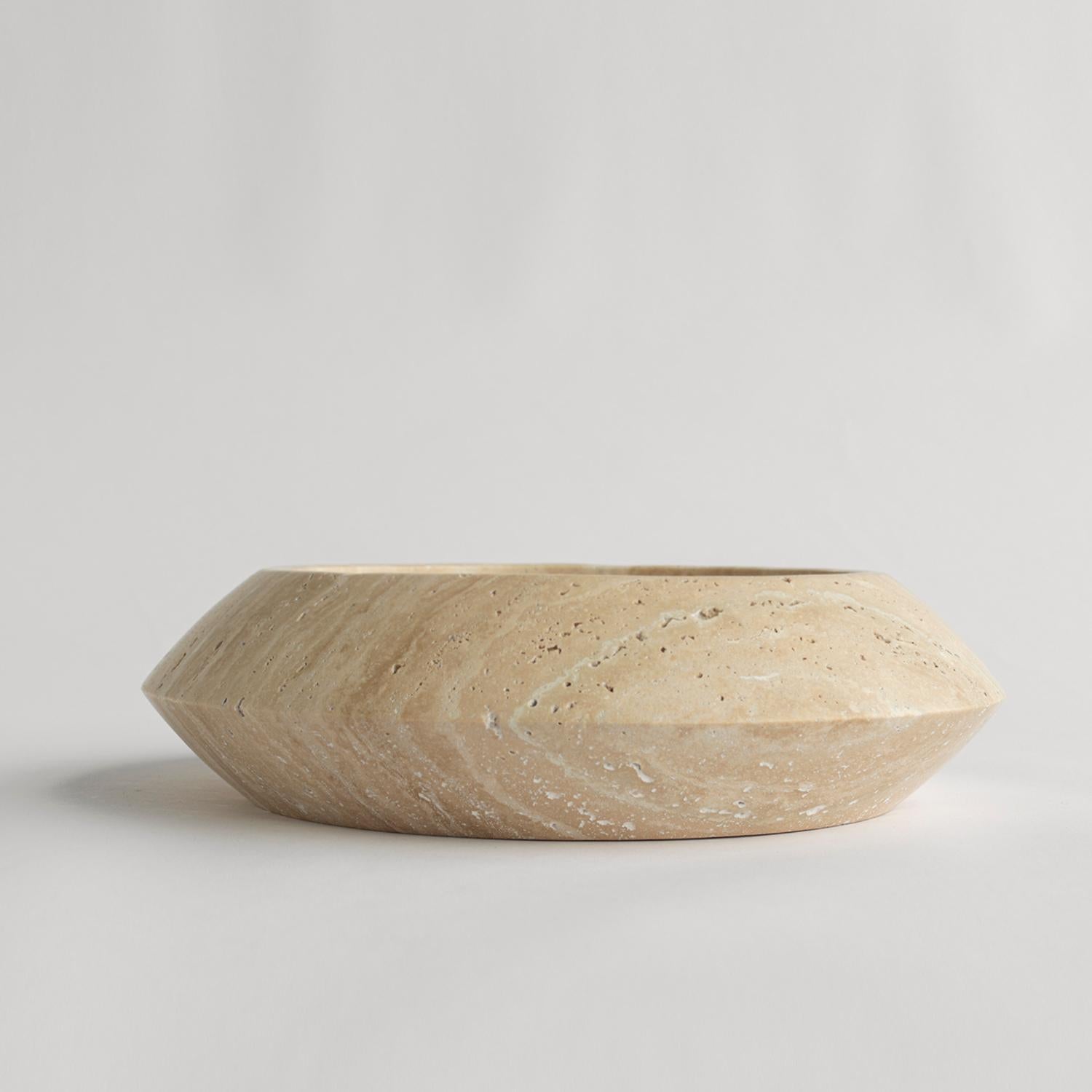 Stunning, aesthetic, timeless are words that can be used to describe this elegant and modern travertine Eclipse bowl from Kiwano. Expertly crafted and finished by hand, our travertine bowls are a study in sculptural simplicity. Natural variations in