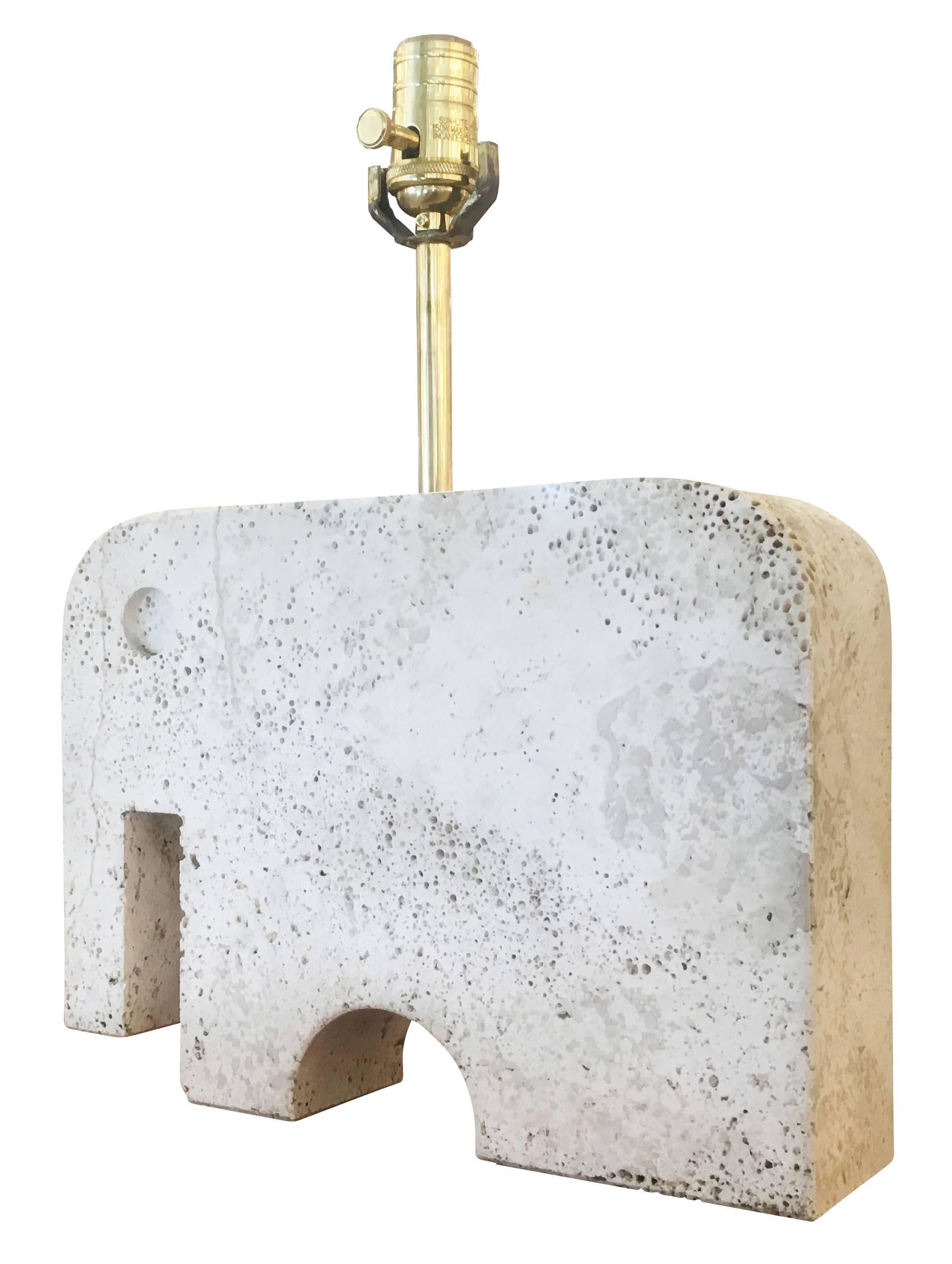 Playful travertine table lamp from the 1950s in the shape of an elephant.

Condition: Excellent vintage condition, minor wear consistent with age and use

Measures: Width 13.75”

Depth 3”

Height 17” (top of socket)
