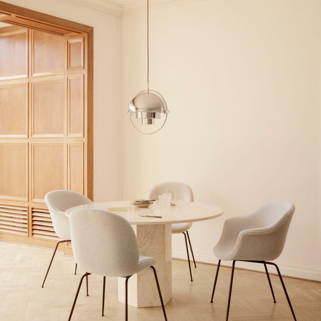 Travertine Epic dining table by GamFratesi for Gubi in Neutral white.

Designed by the Danish-Italian duo GamFratesi for GUBI, the Epic table is a contemporary take on classic architectural elements. Executed in two pieces of solid travertine, the
