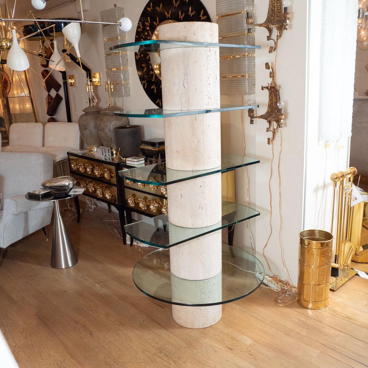 Travertine etagere with five glass shelves.