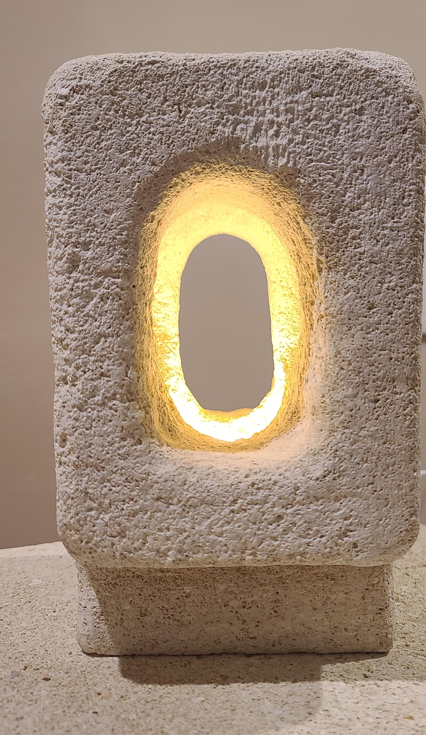 Elevate your space with our exquisite, one-of-a-kind Albamiele lamp. Crafted from genuine sandstone, each lamp is a unique work of art, showcasing the natural beauty and distinct veining of the stone. The warm, ambient glow from the integrated light