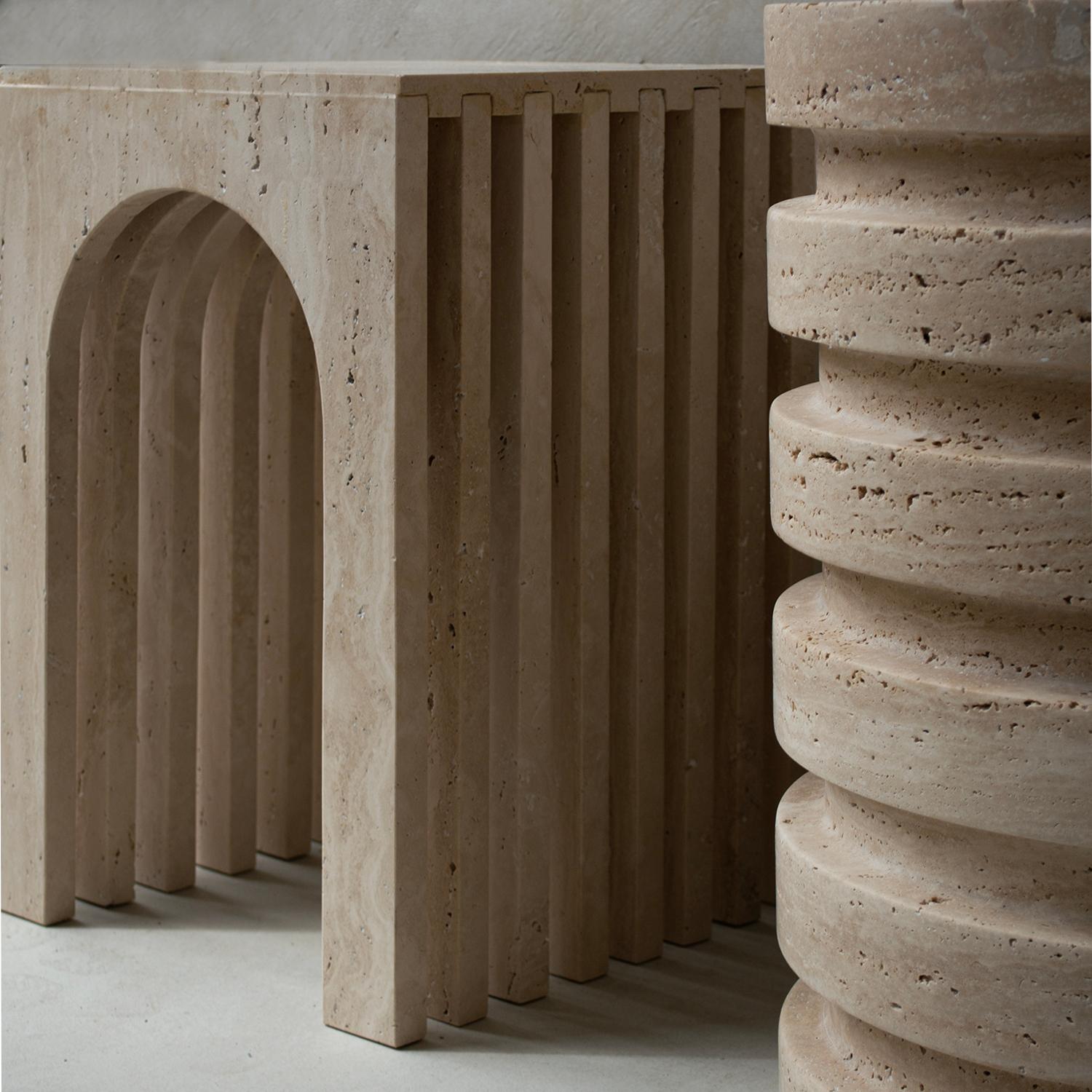 Introducing the Travertine Layered Stool / Side Table, a bold and versatile piece that combines functionality with sculptural beauty. With its solid, heavy construction, this piece can serve as a sturdy side table or as a decorative base for