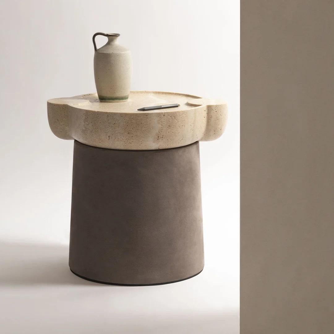 Contemporary travertine & leather side table - Palladio No 3 by Stephane Parmentier for Giobagnara.
The object presented in the image has following finish: Travertine Classic Top and A21 Mud Suede Leather (base) 

Palladio is a line of side tables