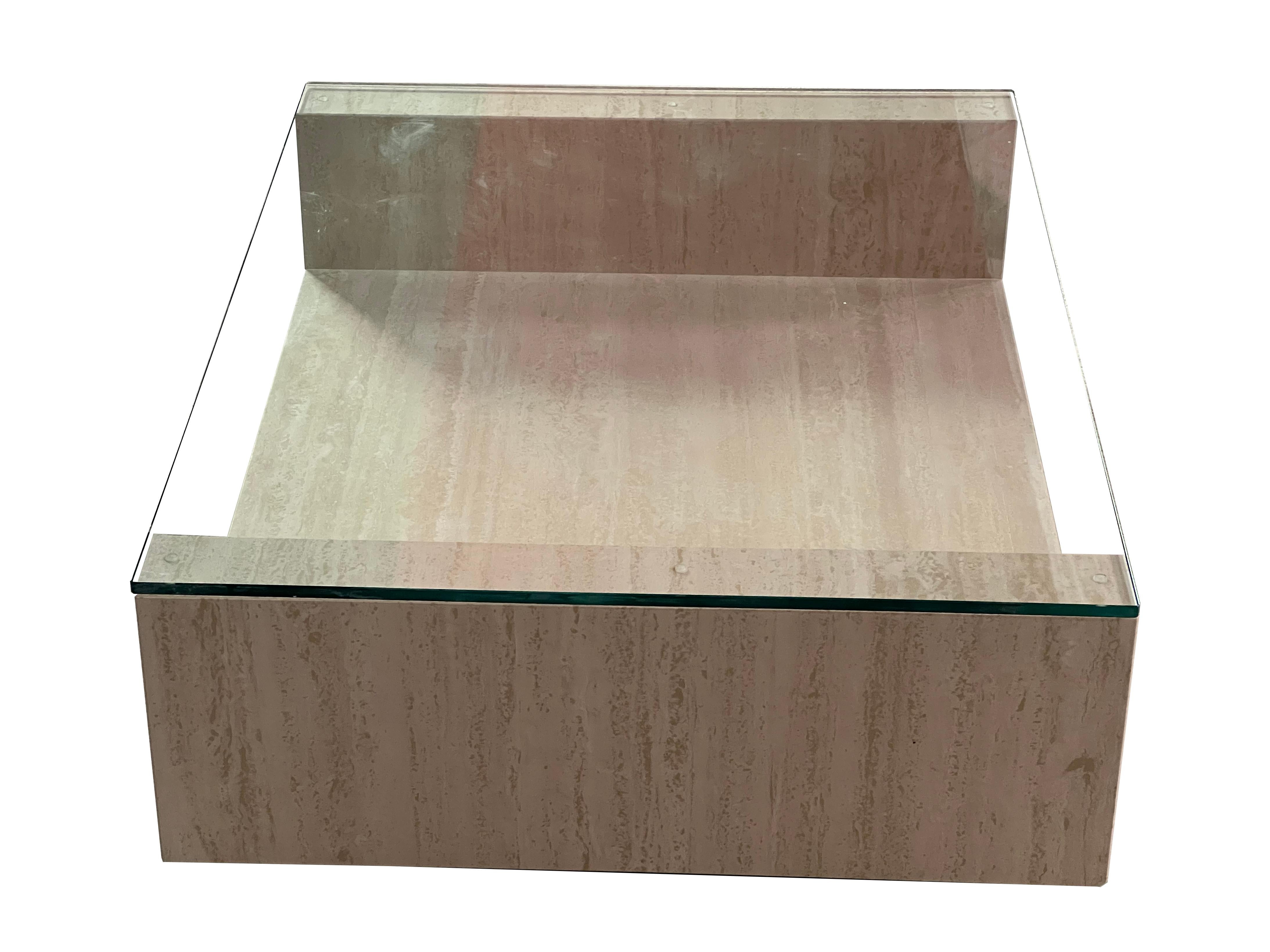 Travertine Marble AMIA Table Contemporary Design Made in Spain Meddel in Stock
The Amia coffee table is a marble design piece consisting of a U-shaped polished travertine marble top and a glass top on top. The structure has casters to facilitate its