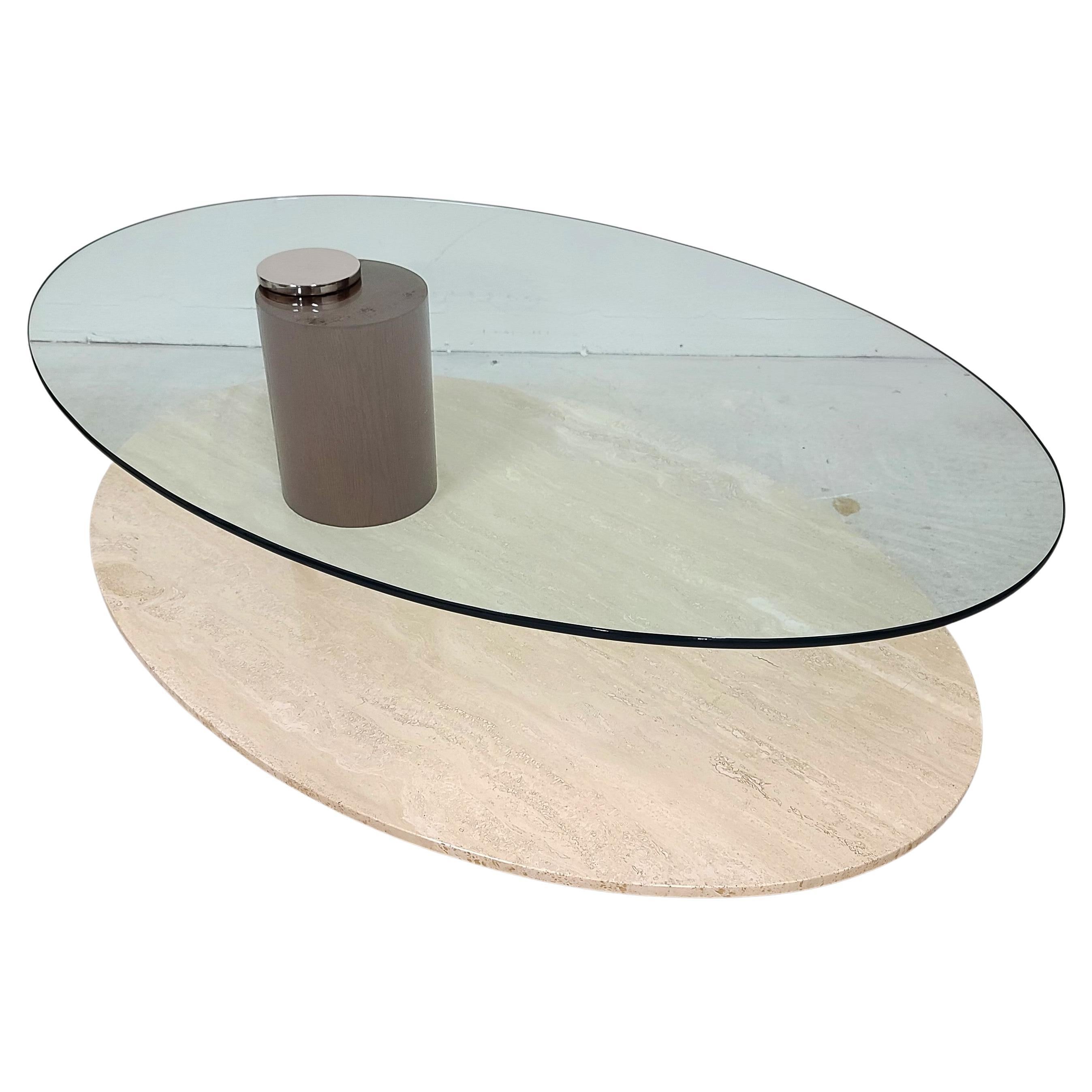 For FULL item description click on READ MORE below. 

Offering One Of Our Recent Palm Beach Estate Fine Furniture Acquisitions Of A

1970's Mid-Century Modern Travertine Marble & Glass Coffee Cocktail Table by Lion in Frost
Glass top swivels 360