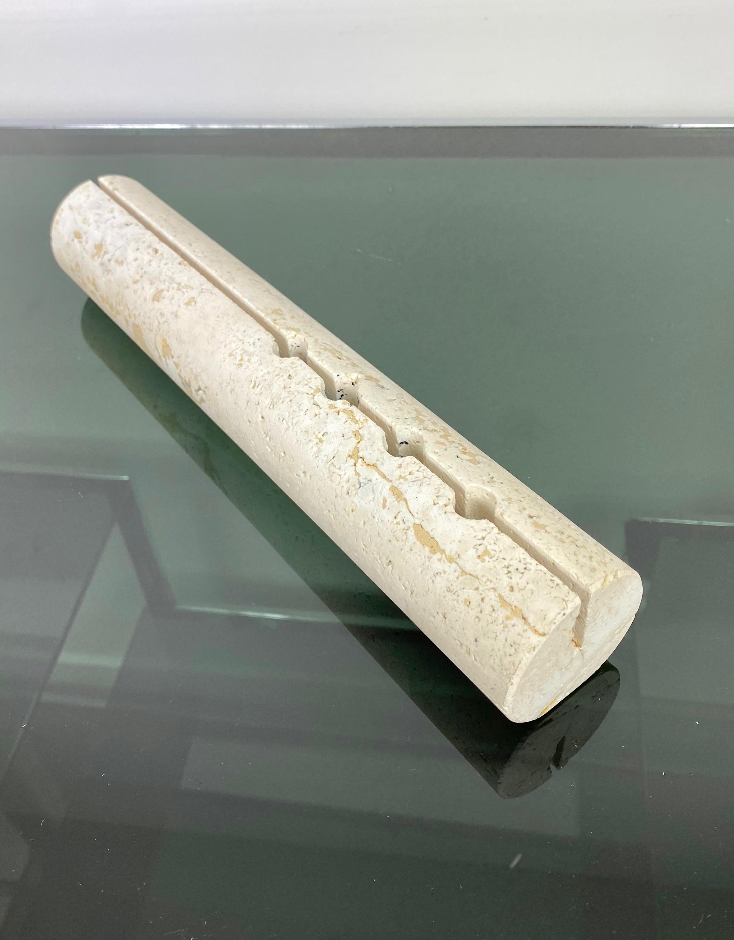 Pen and letter holder, cylindrical shape, in travertine marble by Fratelli Mannelli. Rapolano, Italy, circa 1970. 

It still has its original label on the bottom (as shown in the pictures) saying 