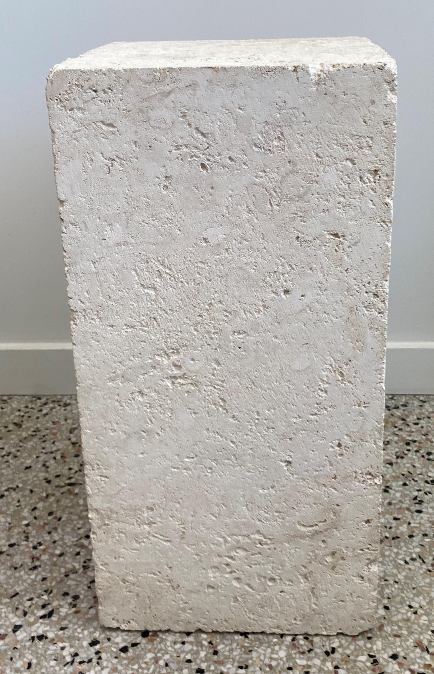 This stylish, clean-lined travertine marble pedestal will make the perfect perch for your sculpture and could be used outdoors or indoors.