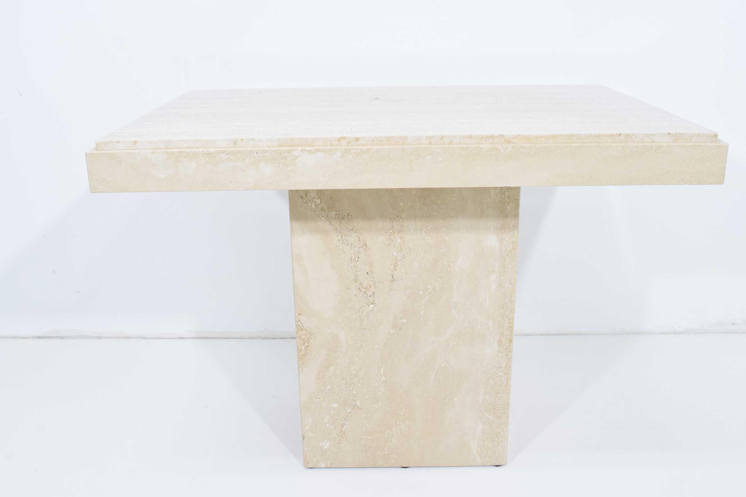 Very nice travertine marble side tables.