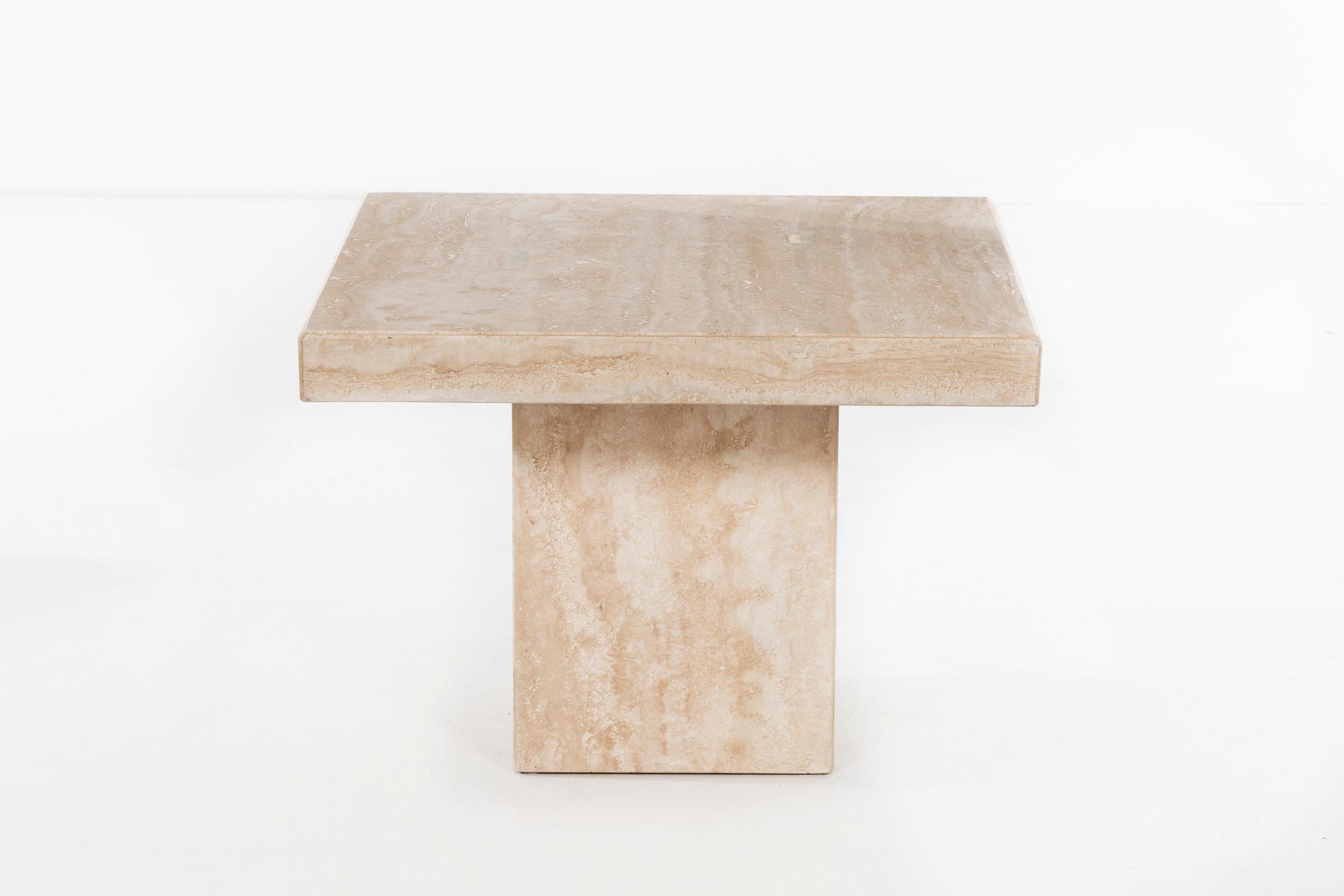 Travertine side table, beveled edge, fully filled and polished. Top securely fits on base and is held gravitationally.