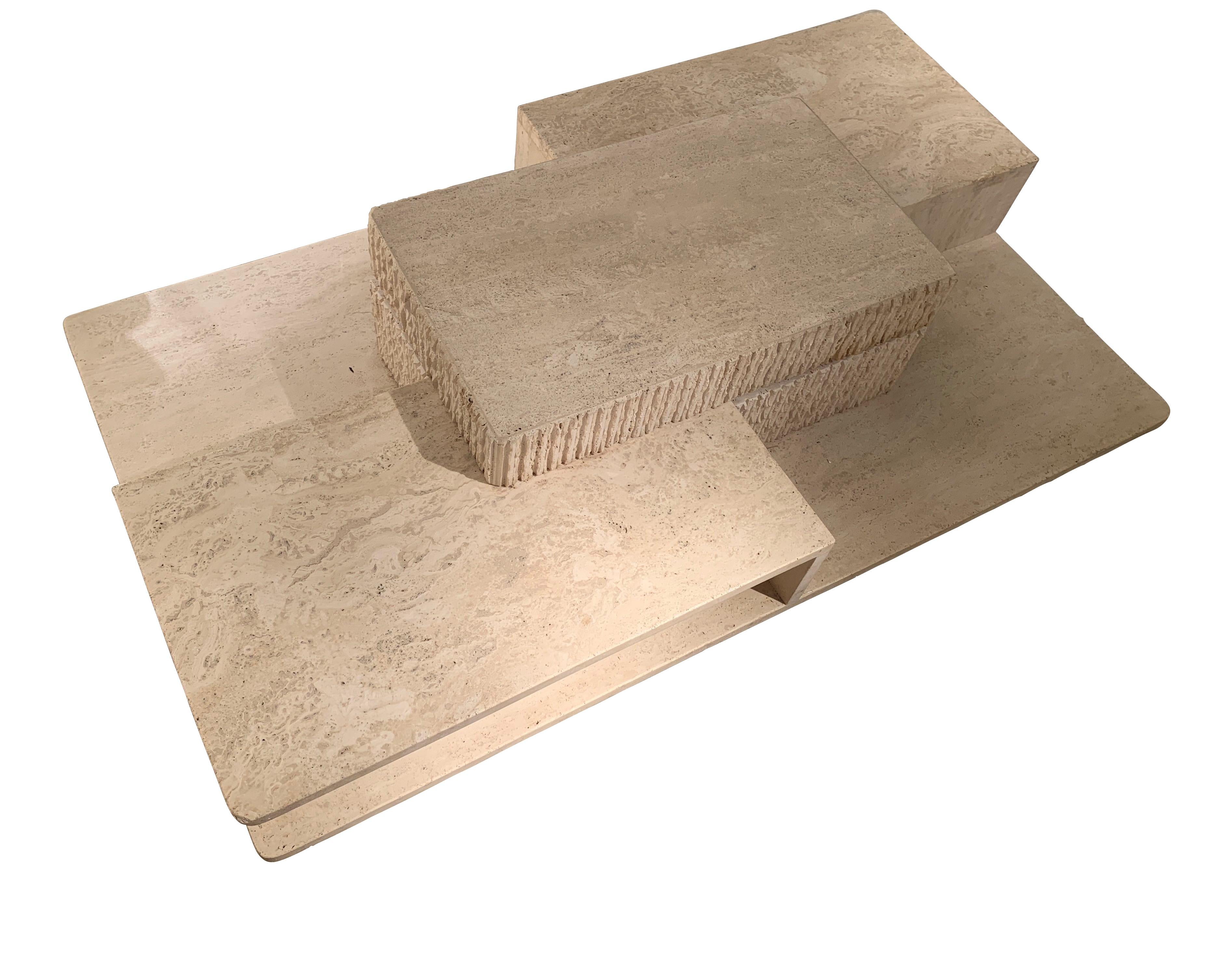 1970s French multi level travertine coffee table
Honed and unfilled finish
Partial decorative chiselled design on 
       