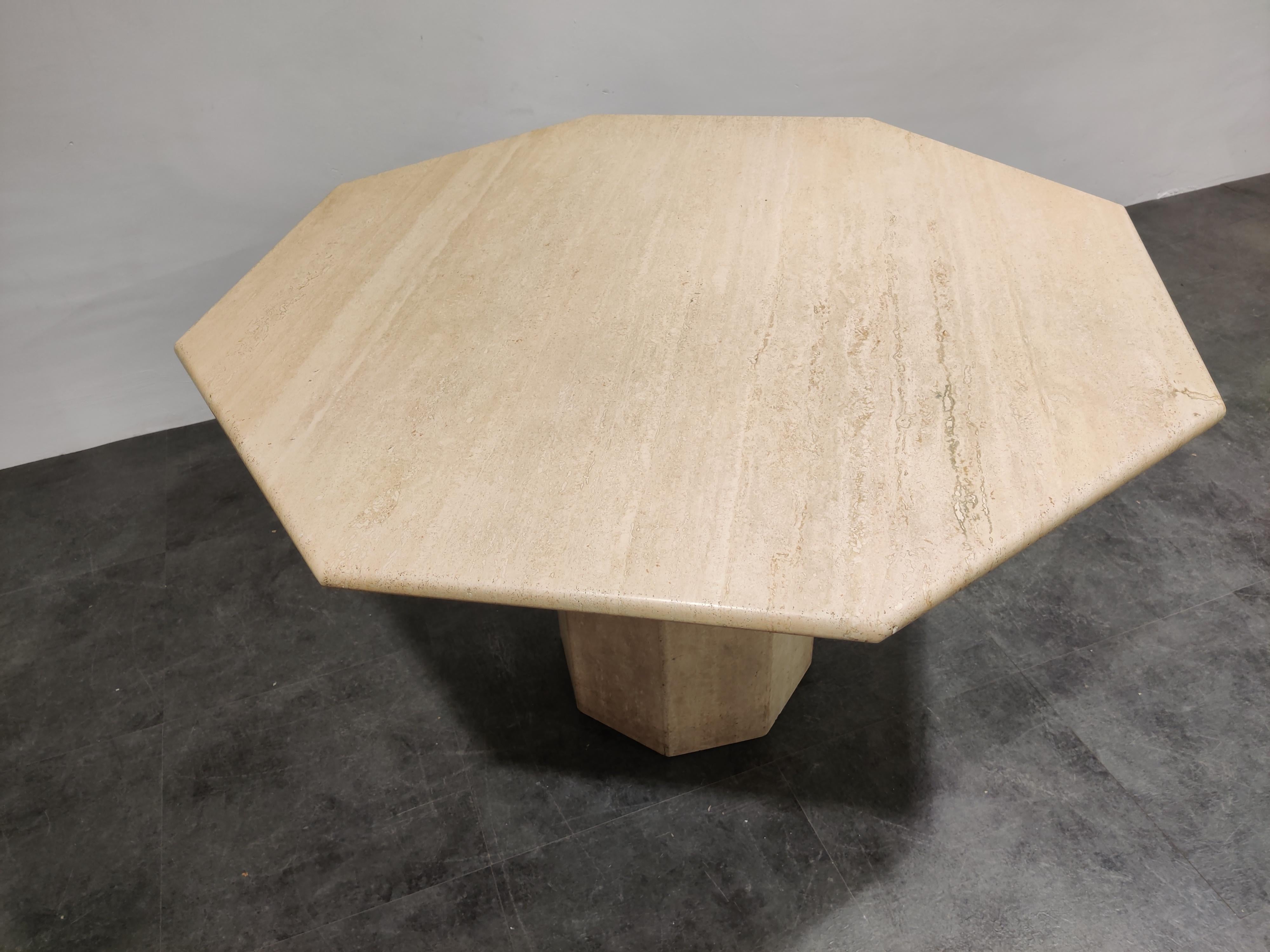 Beautiful dining table made from travertine stone with an octogonal base and top.

Nicely finished top.

Can be combined with many interior styles.

Good condition, normal wear. 

1970s, Italy

Measures: Height 74cm/29.13