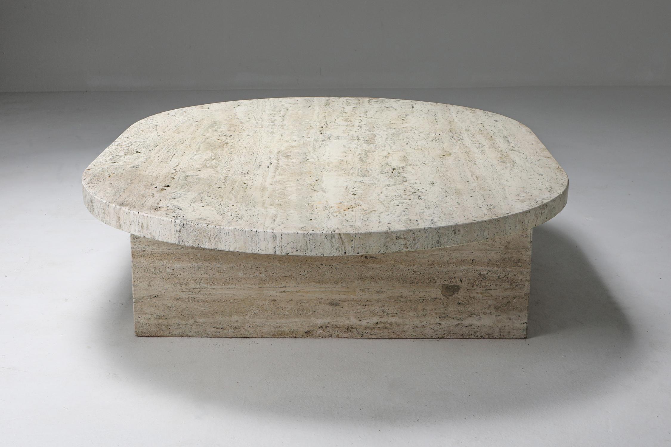 Brutalism, minimalism, travertine, coffee table, oval, France, 1970s

Gorgeous thick slabs of travertine in an elegant no nonsense shape.
Less is more is certainly the case here.
It's a very white type of travertine, the most expensive
