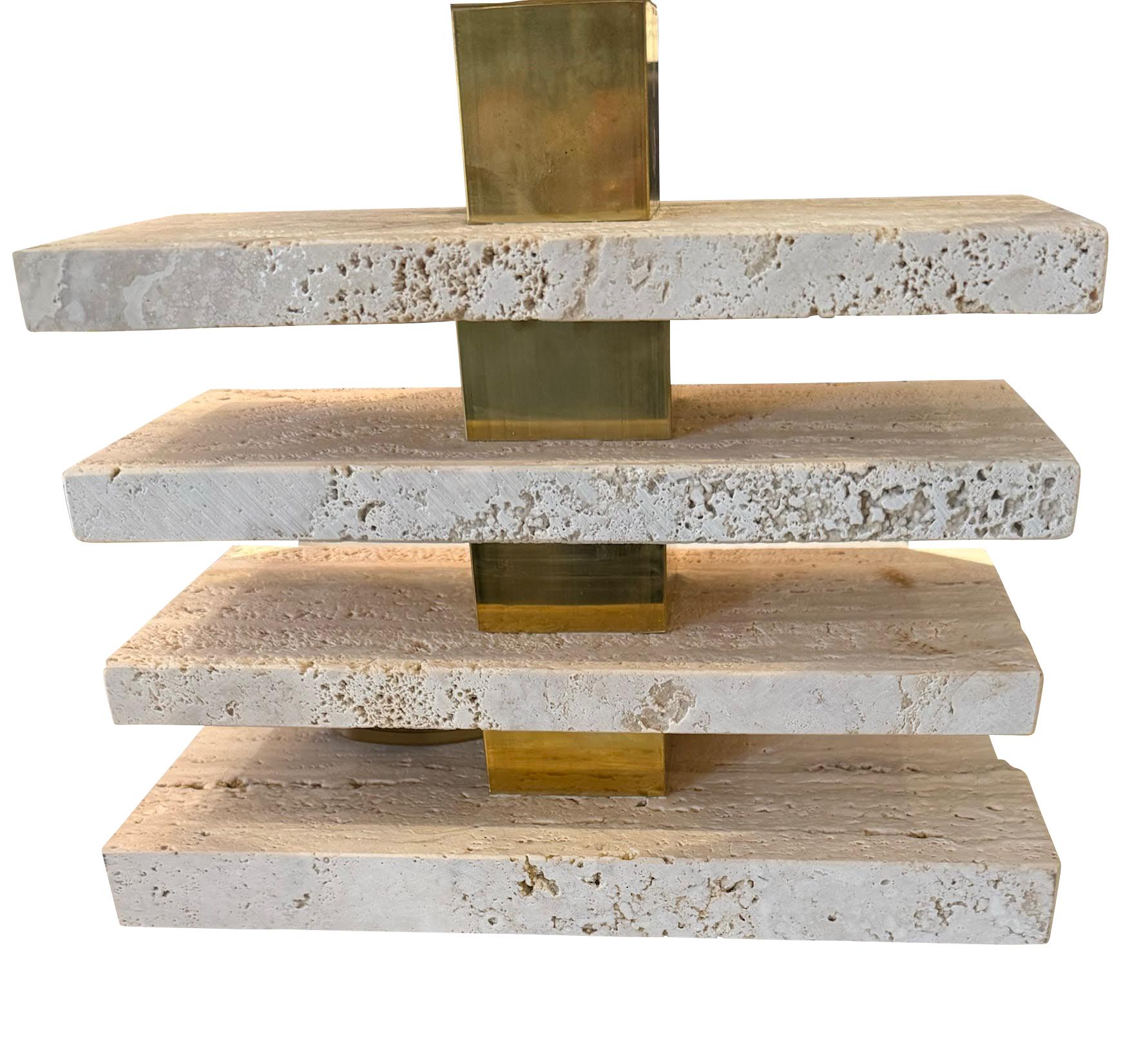 Contemporary Italian pair of stacked rectangular shaped travertine lamps.
Honed and unfilled finish.
Shades included.
Shades measure 15.5 diameter.
Base measures 11
