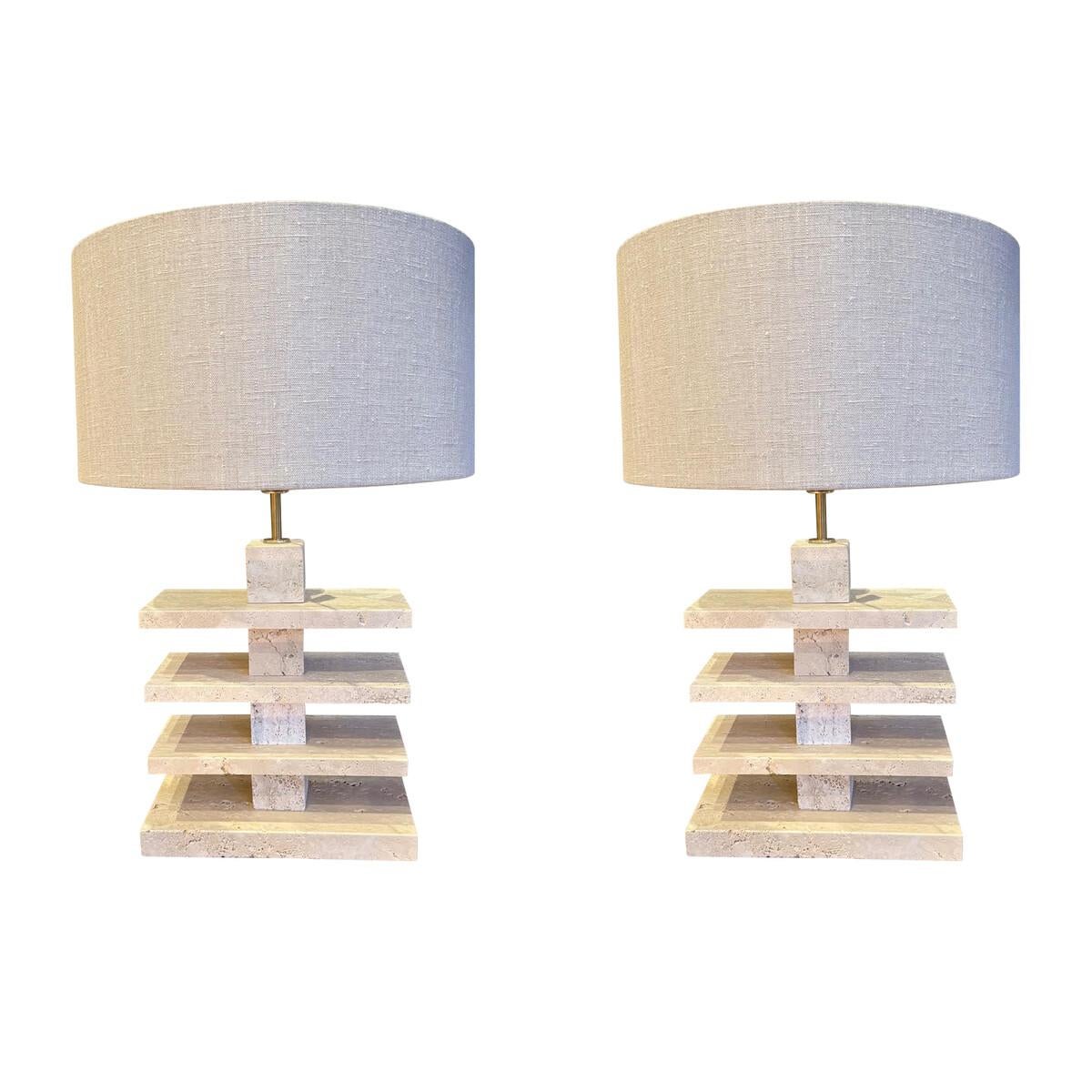 Mid Century Italian pair of stacked rectangular shaped travertine lamps.
Honed and unfilled finished.
New Belgian linen shades included and measure 16