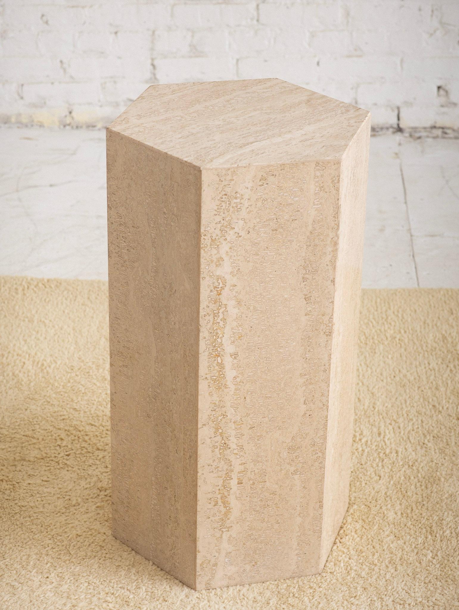 Post Modern travertine pedestal. Octagon shaped. A glass top could be added at your discretion to convert to a dining table. Glass not included.