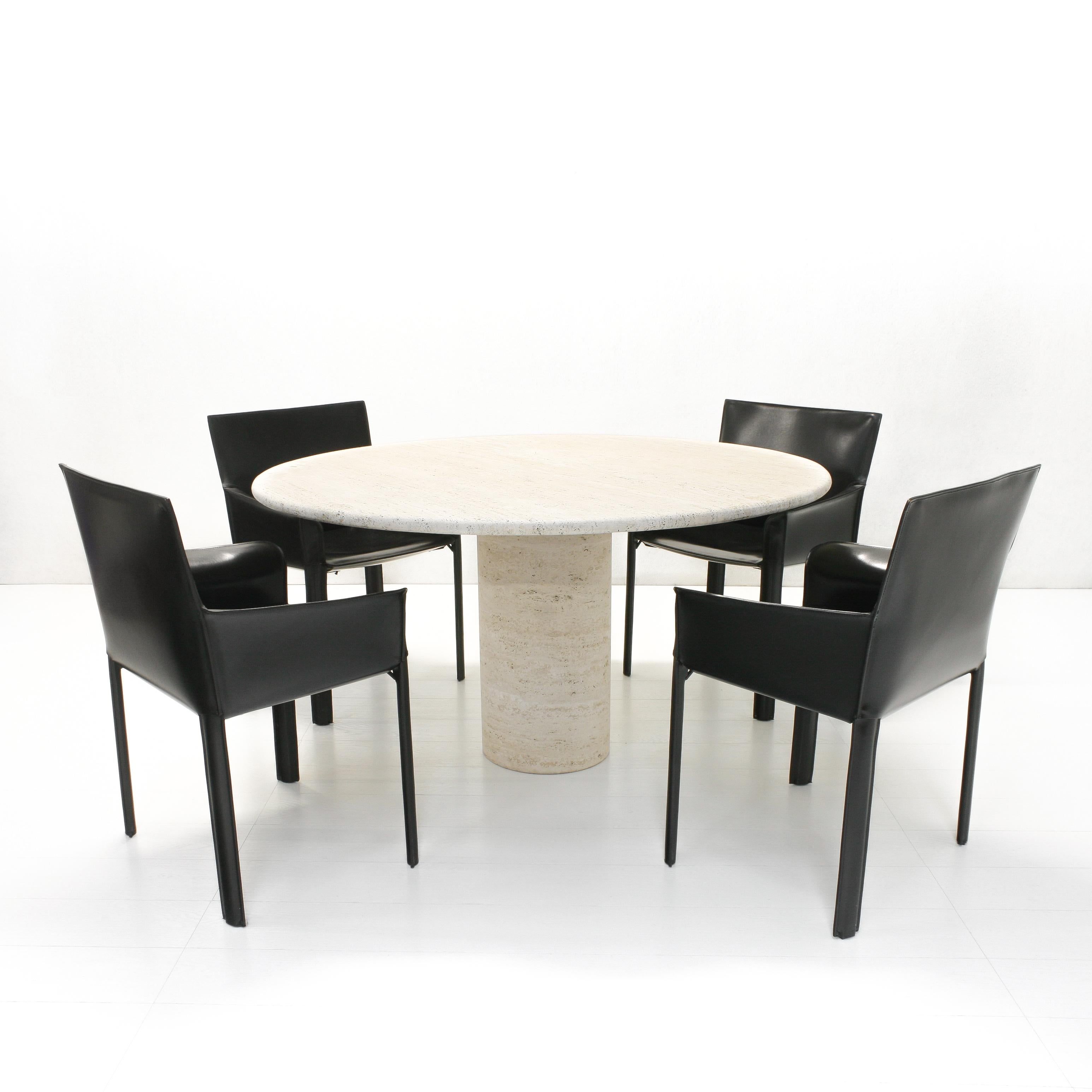 This large stylish Italian travertine dining table has a robust look with a beautiful, subtle texture created by the partially open structure limestone.
The hollow cylindrical stand can be turned around to created a different look.