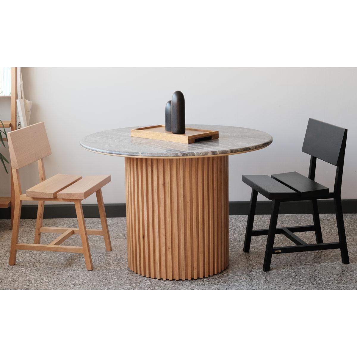 The DOCIA Series Marble-Top Solid Oak Table is a seamless fusion of modern design and natural materials. Featuring a natural travertine marble tabletop and premium solid oak slatted legs, this table combines elegance, durability, and functionality,