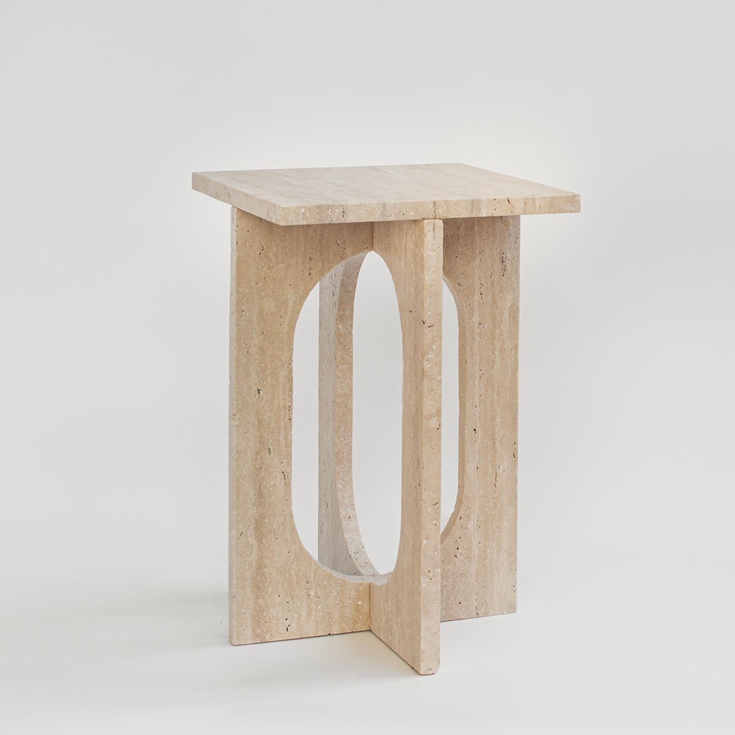 BOND Side Table in Travertine -  Bond Side Table evokes simplicity with its modern, clean design. Crafted from honed travertine, this piece is a stylish addition to any space with its sophisticated, clean lines and sleek construction. Use Bond as a