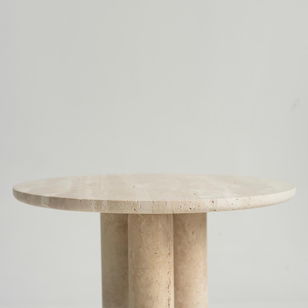 Travertine Side Table on three pieces of cylinder

Stunning, aesthetic, timeless are words that can be used to describe this elegant and modern travertine side table from Kiwano. Expertly crafted and finished by hand, our travertine side tables