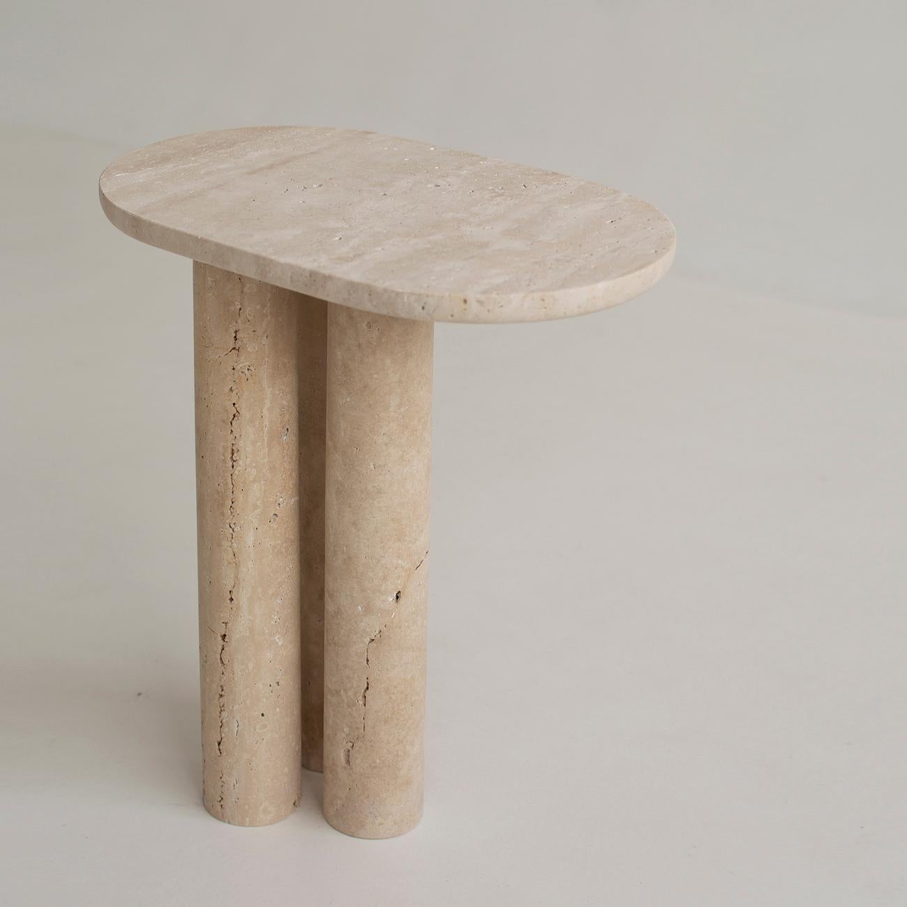 Travertine side table on three pieces of cylinder.

Stunning, aesthetic, timeless are words that can be used to describe this elegant and modern travertine side table from Kiwano. Expertly crafted and finished by hand, our travertine side tables