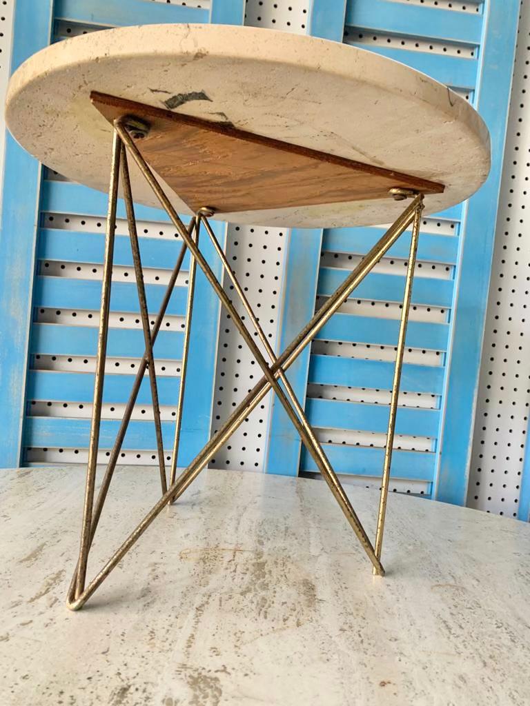 Wonderful travertine side table from the 1960s by Martin Perfit for the American company Rene Brancusi. Beautiful brass base and round travertine top . In good condition. No broken parts or chips in the travertine. Great for any home.