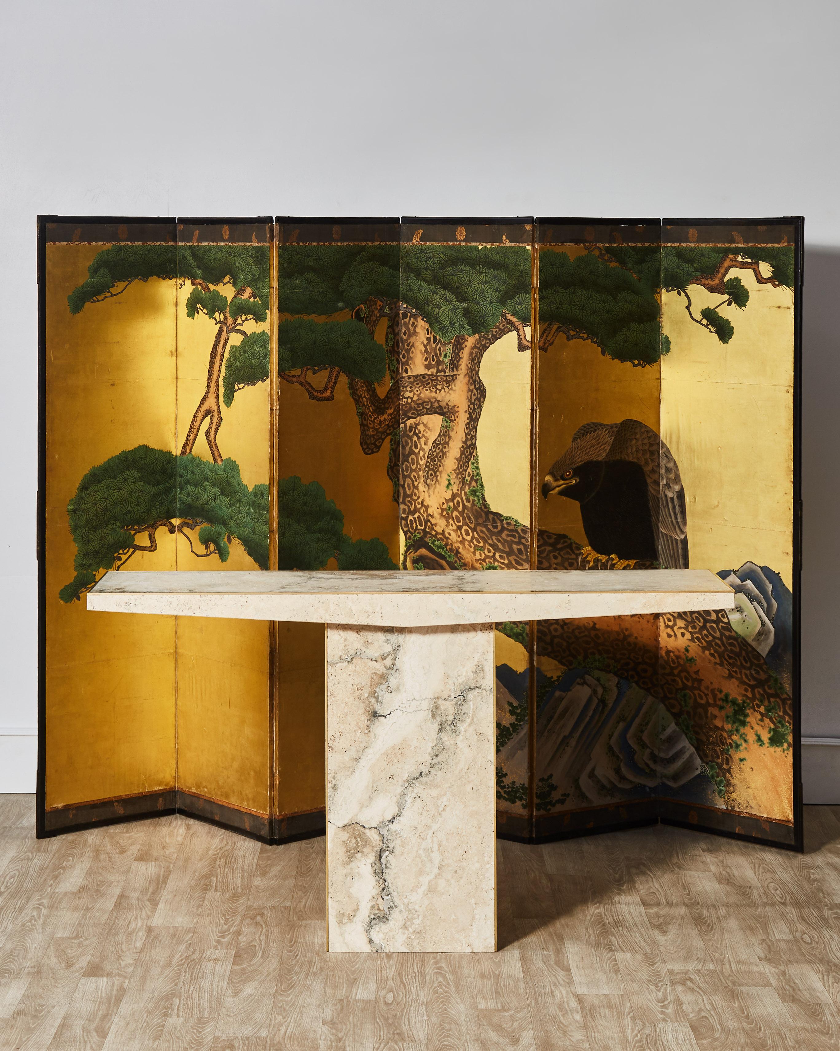 Elegant console in massive travertine stone with brass inlays by Studio Glustin.
France, 2022.