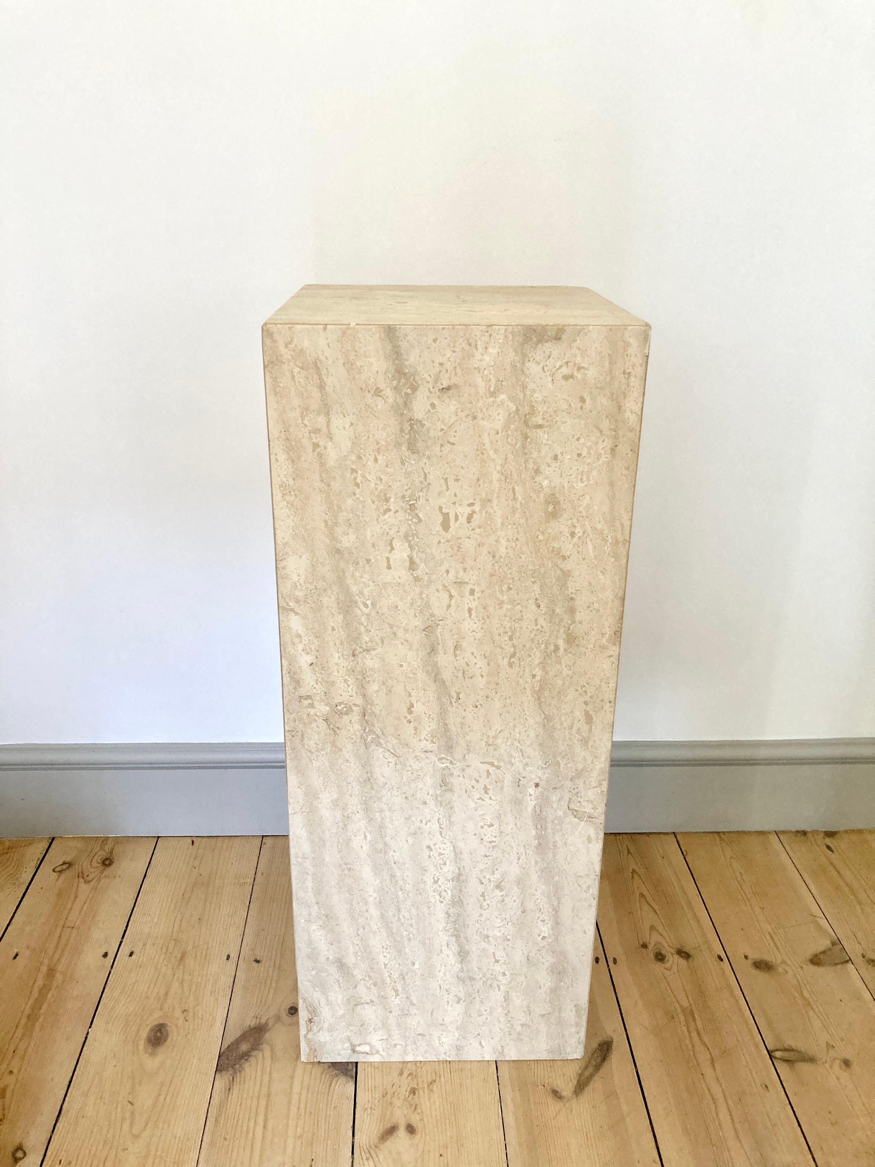 Free standing plinth in semi matt, light tone travertine stone.

Simple geometric design

Very good condition, no scratches or stains, light signs of use. There are couple of areas of imperfection which do not appear to be damage but more likely to