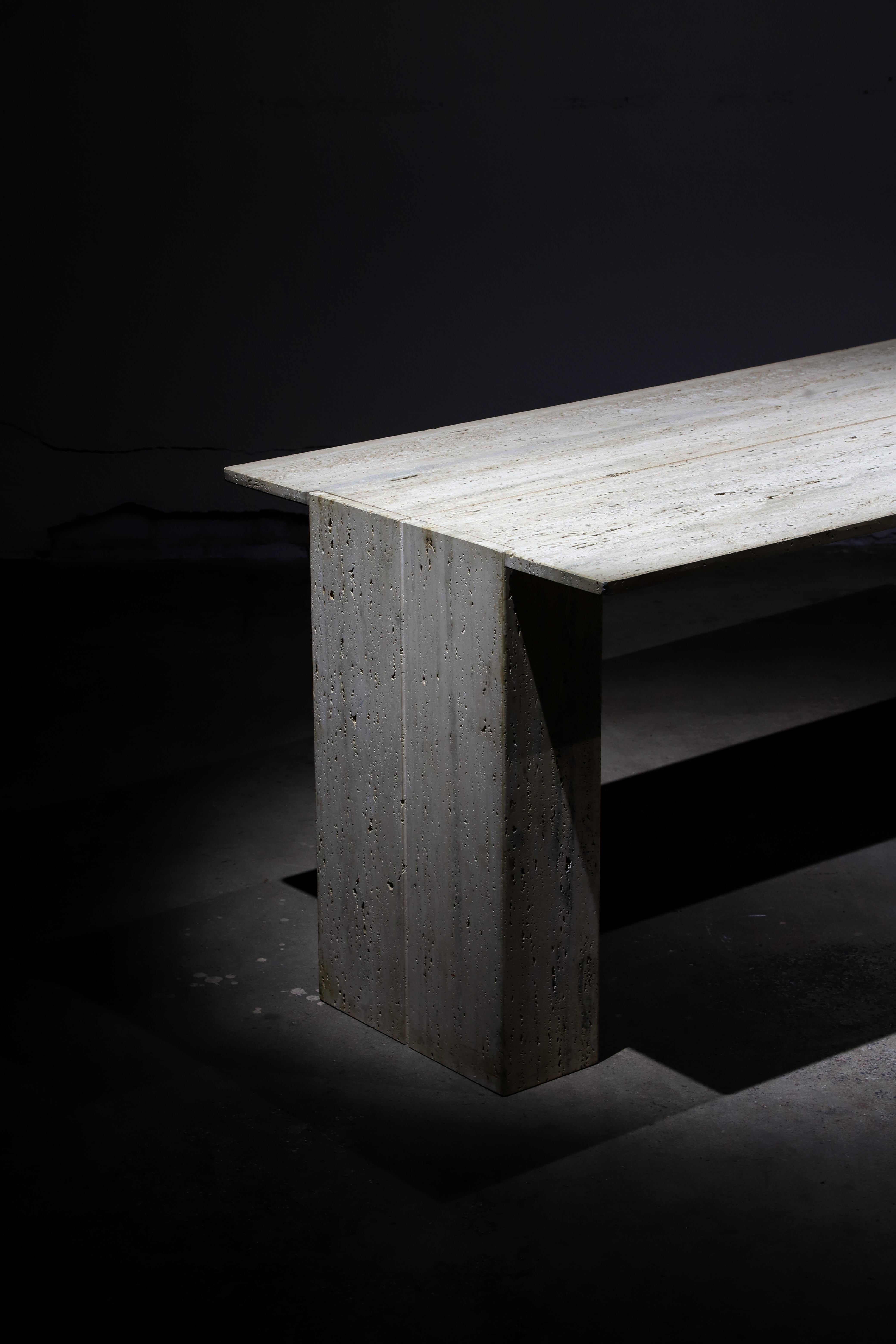 Elegant travertine dining table, entry table or desk. Large travertine slab rests atop two travertine boxed columns.