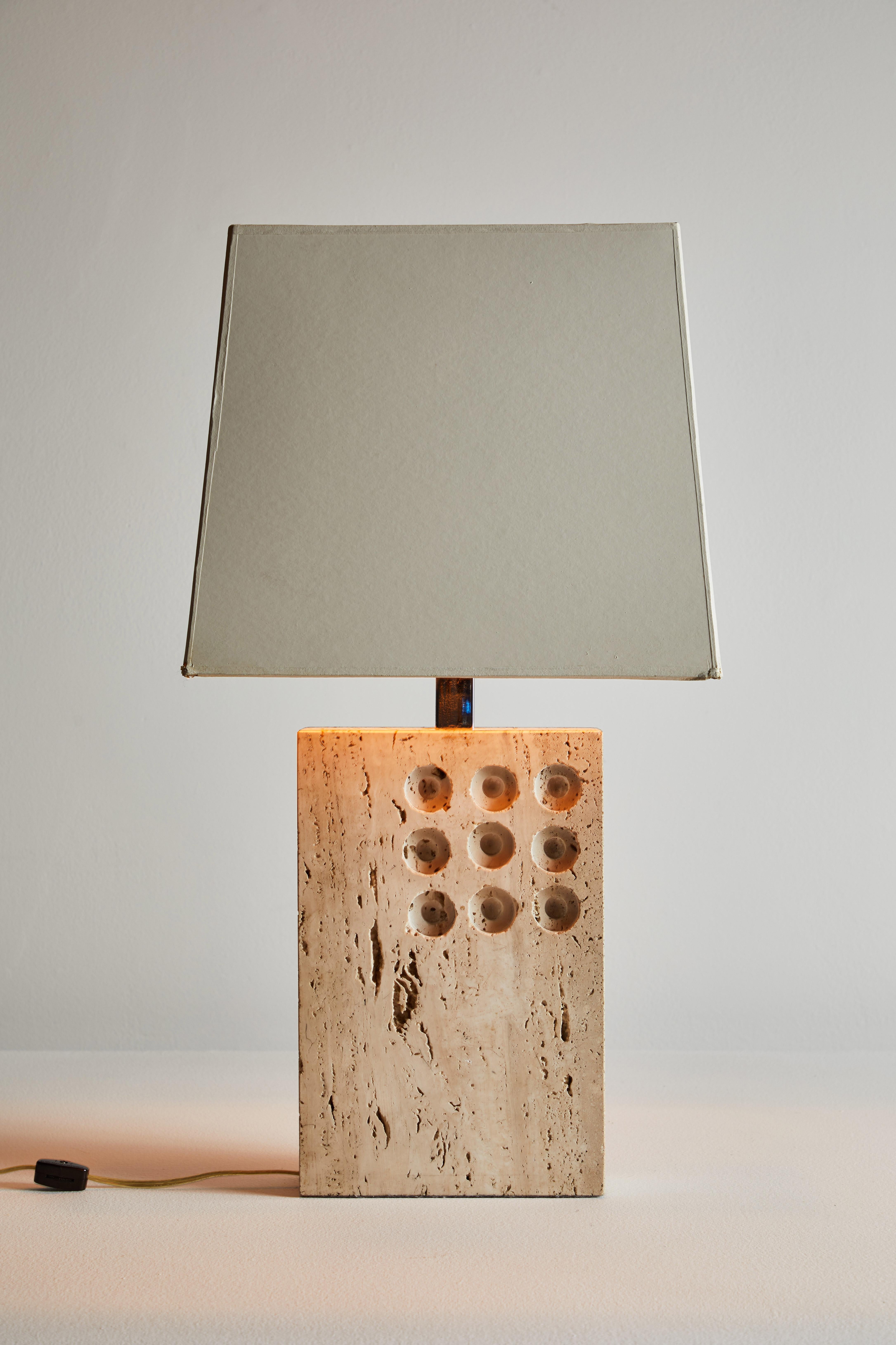Travertine Table Lamp by Raymor. Manufactured in Italy, circa 1970s. Original lacquered paper shade with travertine base. Original cord. Takes one E27 75w maximum bulb. Bulbs provided as a one time courtesy.