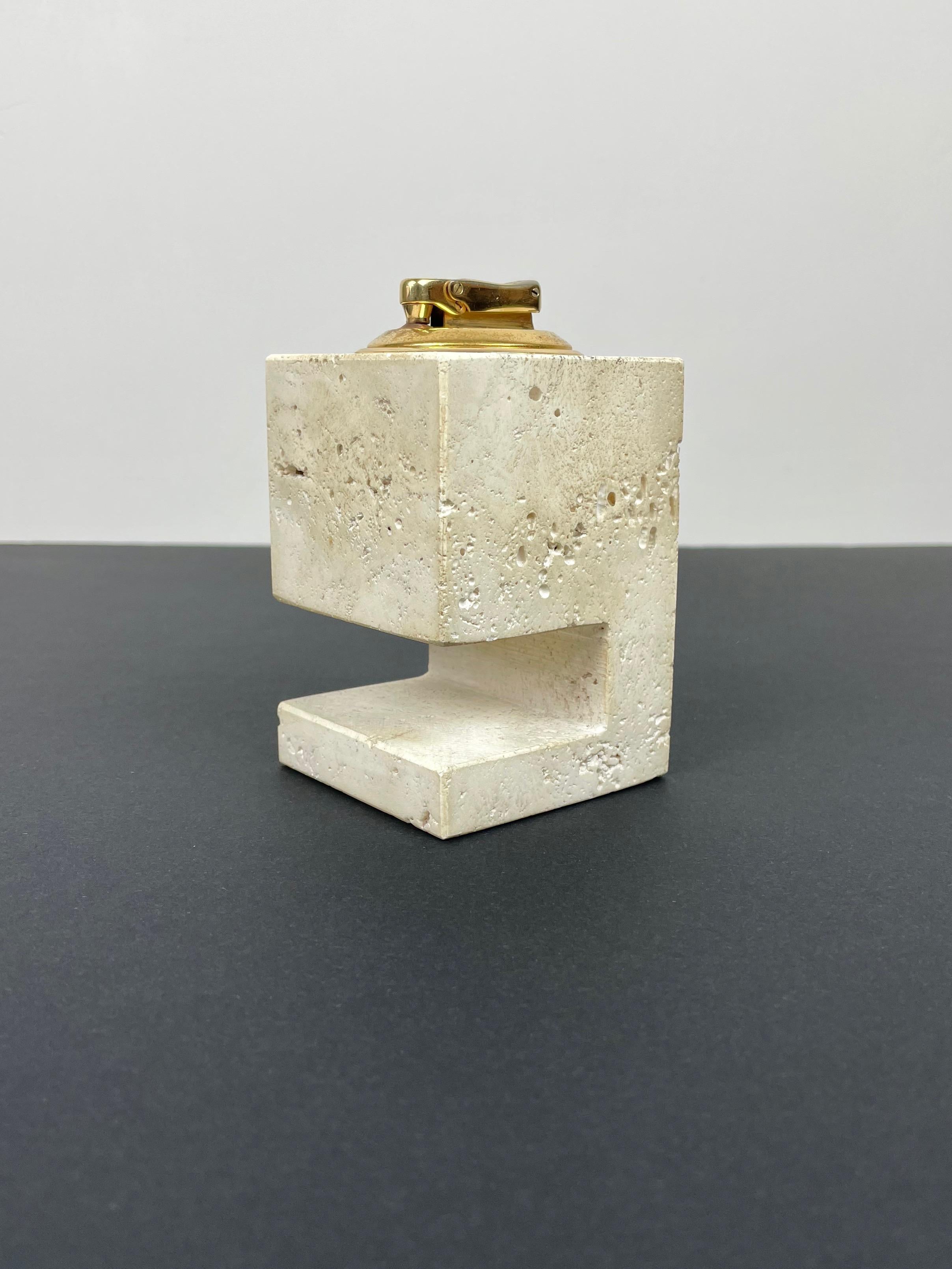 Table lighter in true travertine of Rapolano, Italy made by the Italian designers Fratelli Mannelli in the 1970s. 

Original labels still attached on the bottom as shown in the pictures.