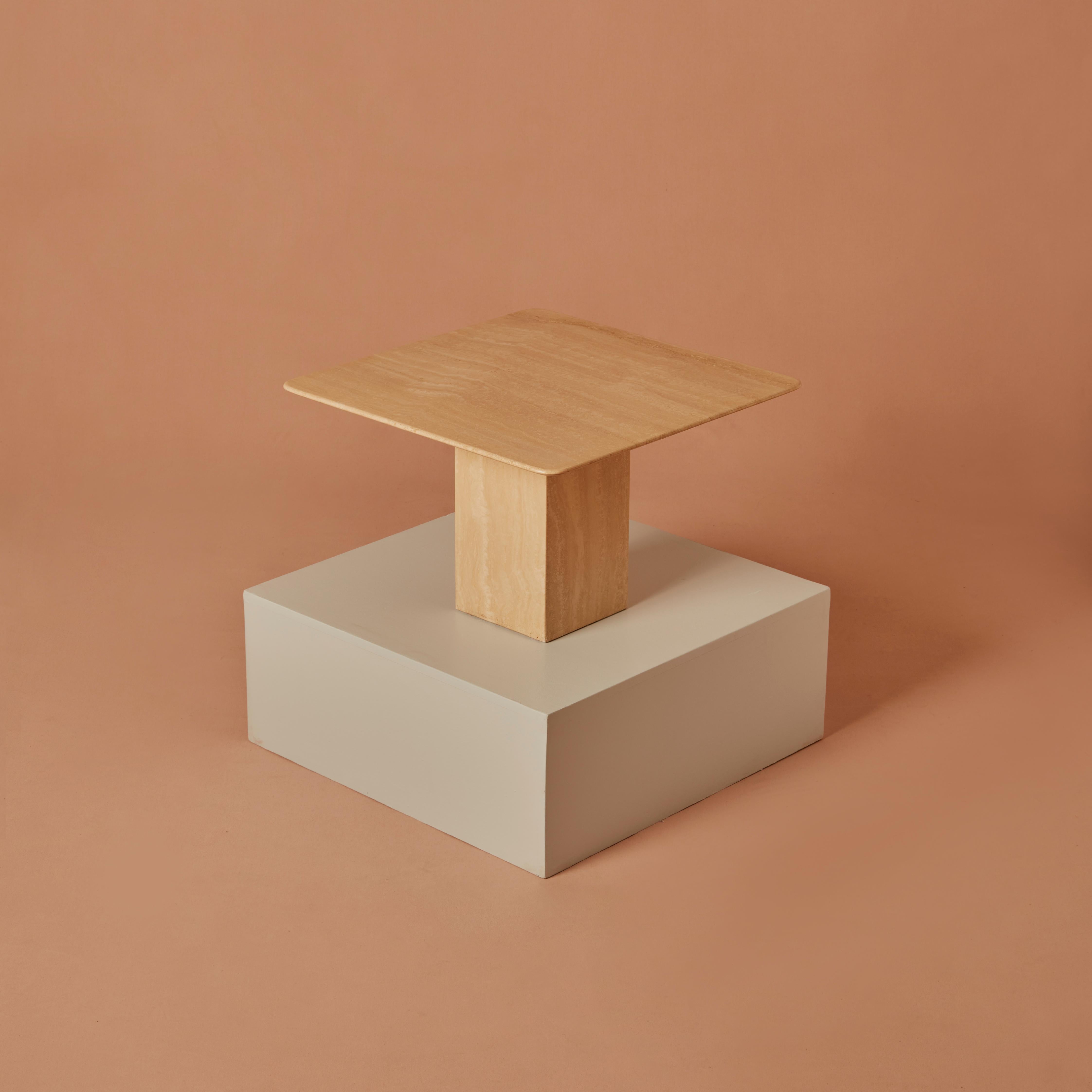 Side table / coffee table, travertine, 1970s, Italy. Travertine side table with a square top with rounded corners and a block-shaped base, H.45cm, W.70cm, D.70cm.