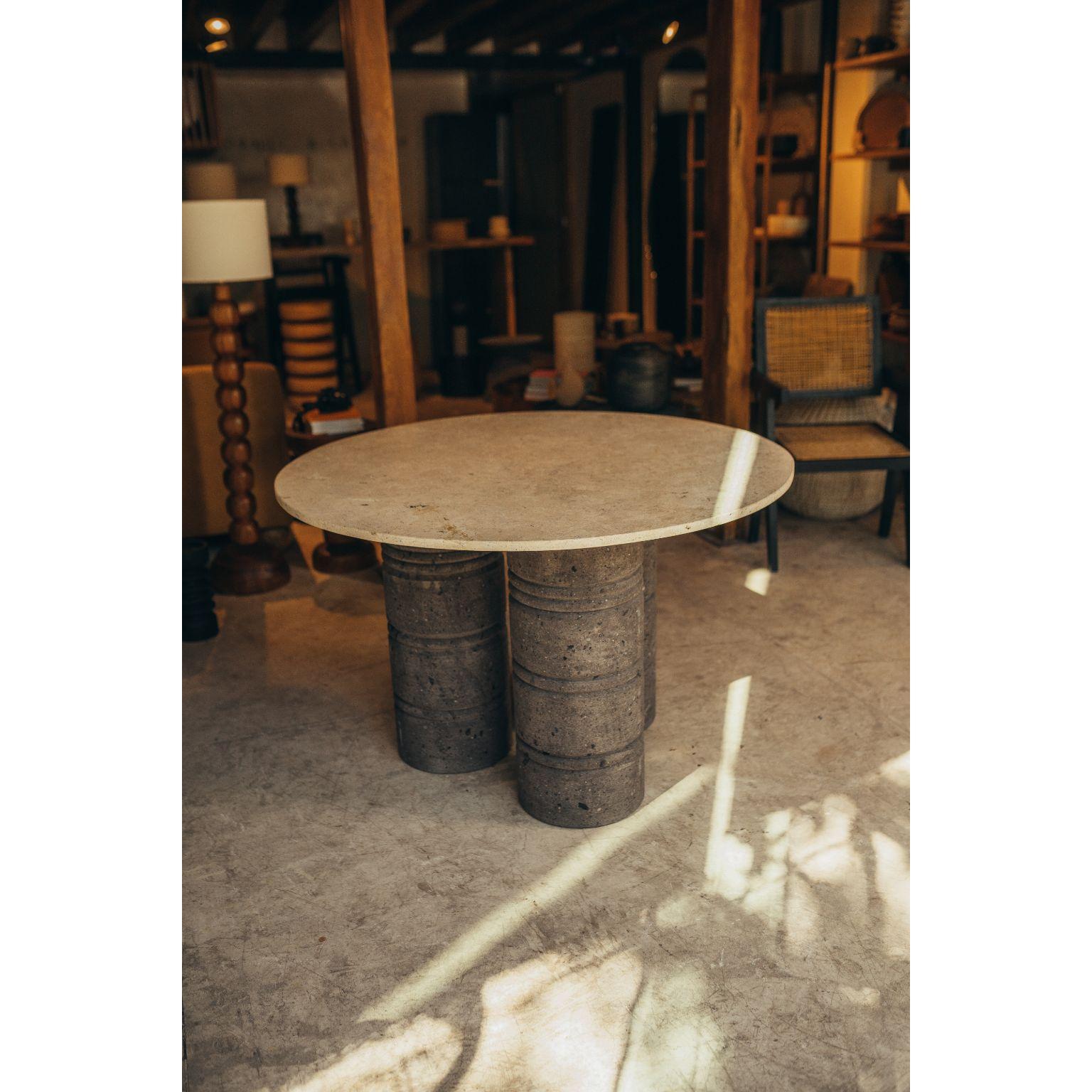 Travertine table with Turned Quarry Legs by Daniel Orozco
Dimensions: D 120 x H 75 cm
Materials: Travertine

Daniel Orozco Estudio
We are an inclusive interior design estudio, who love to work with fabrics and natural textiles in makes our